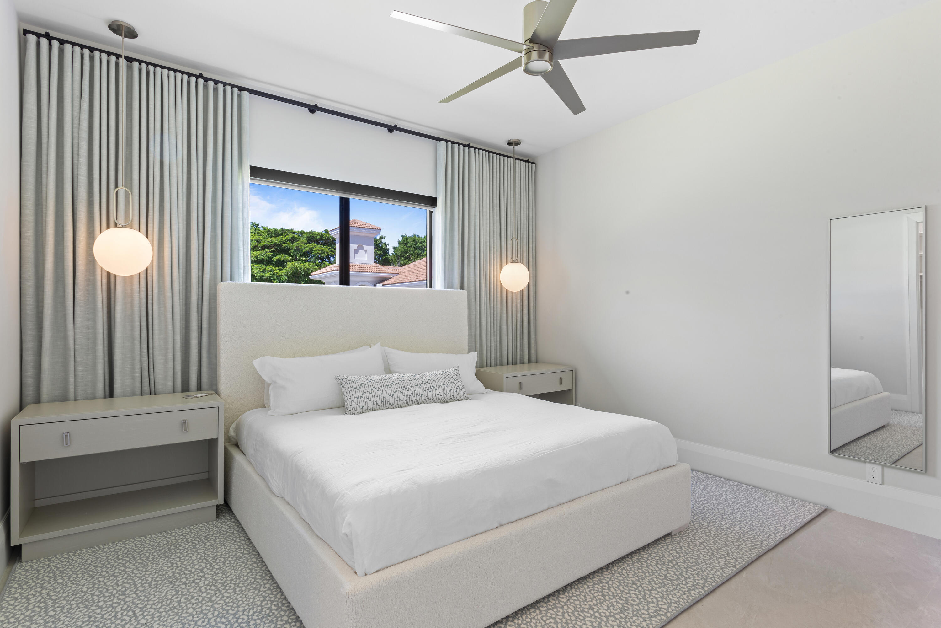 6009 Le Lac Road Boca Raton, FL 33496 - Photo 22 of 35 a bedroom with a bed and window