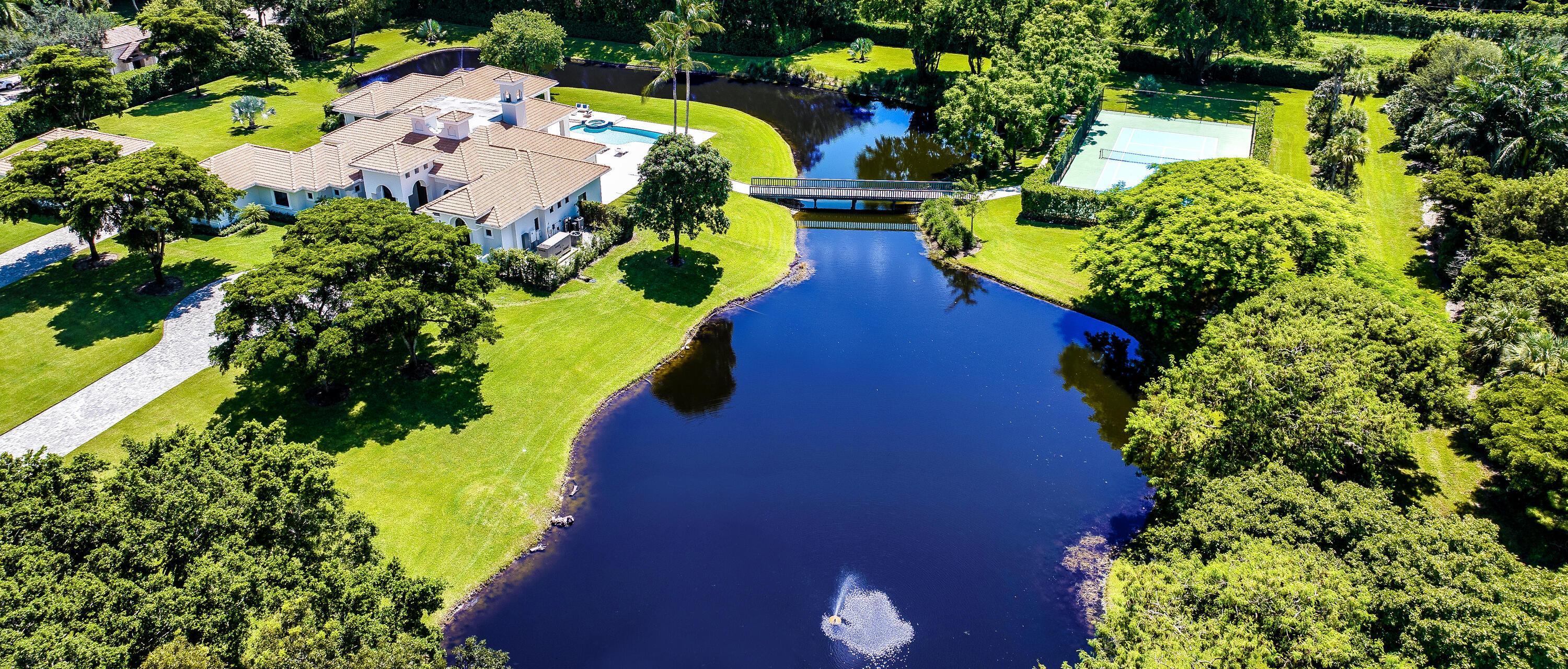 6009 Le Lac Road Boca Raton, FL 33496 - Photo 34 of 35 view of a house with a yard