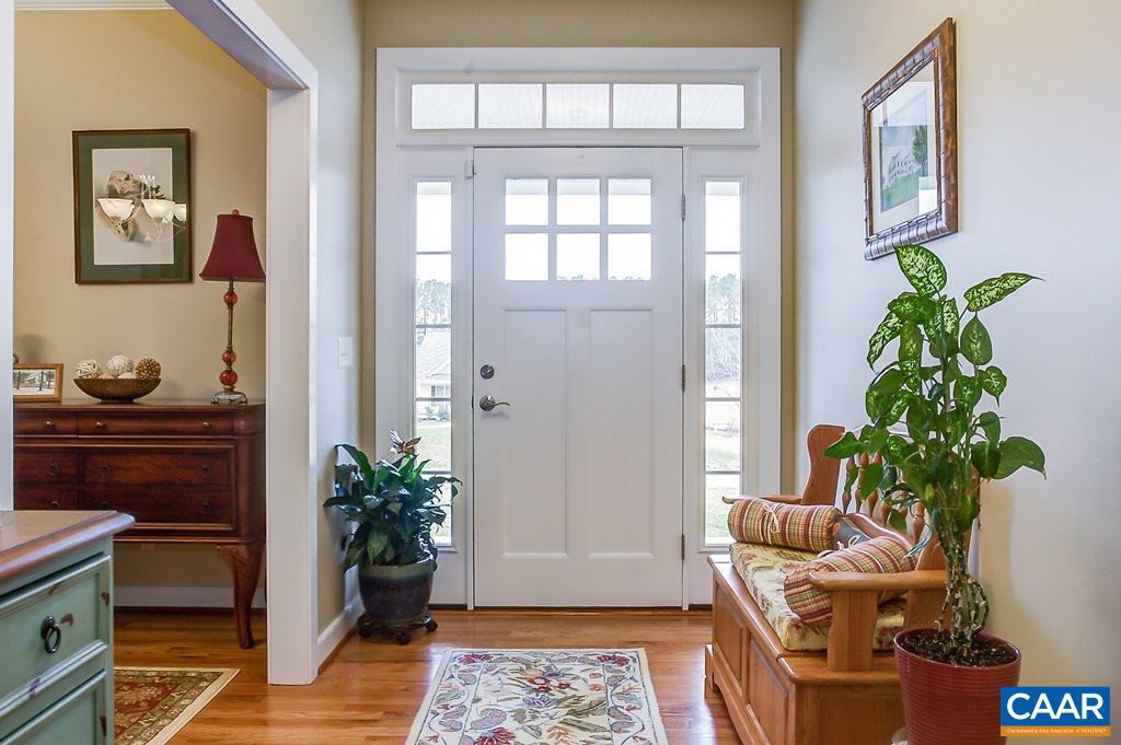 148 Wexford Ridge Road Ruckersville, VA 22968 - Photo 5 of 36 a living room with furniture and a potted plant