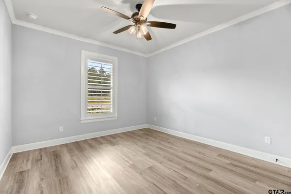 a bathroom with a granite countertop shower