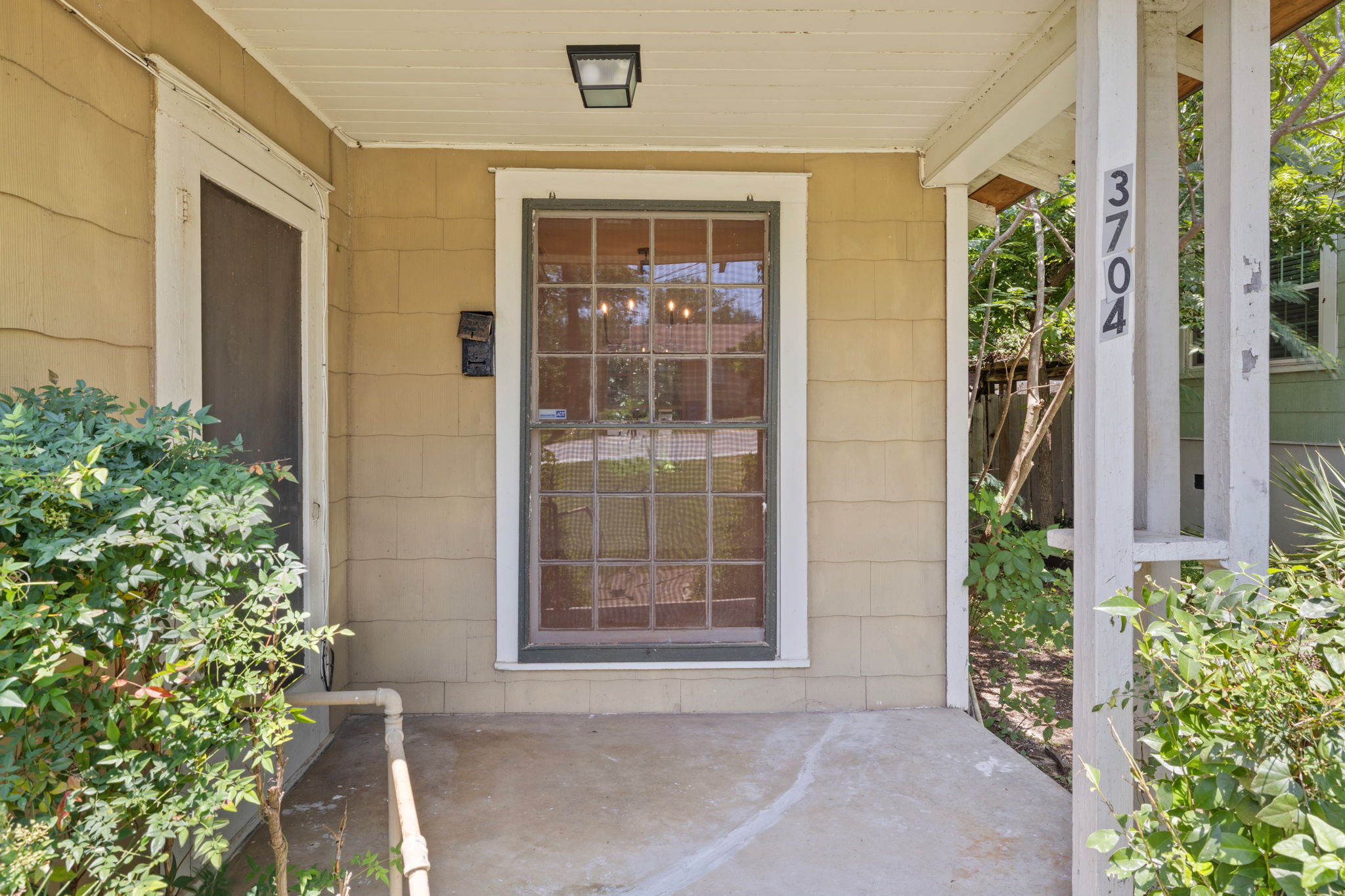 3704 Cherrywood Road Austin, TX 78722 - Photo 4 of 40 A welcoming front porch.
