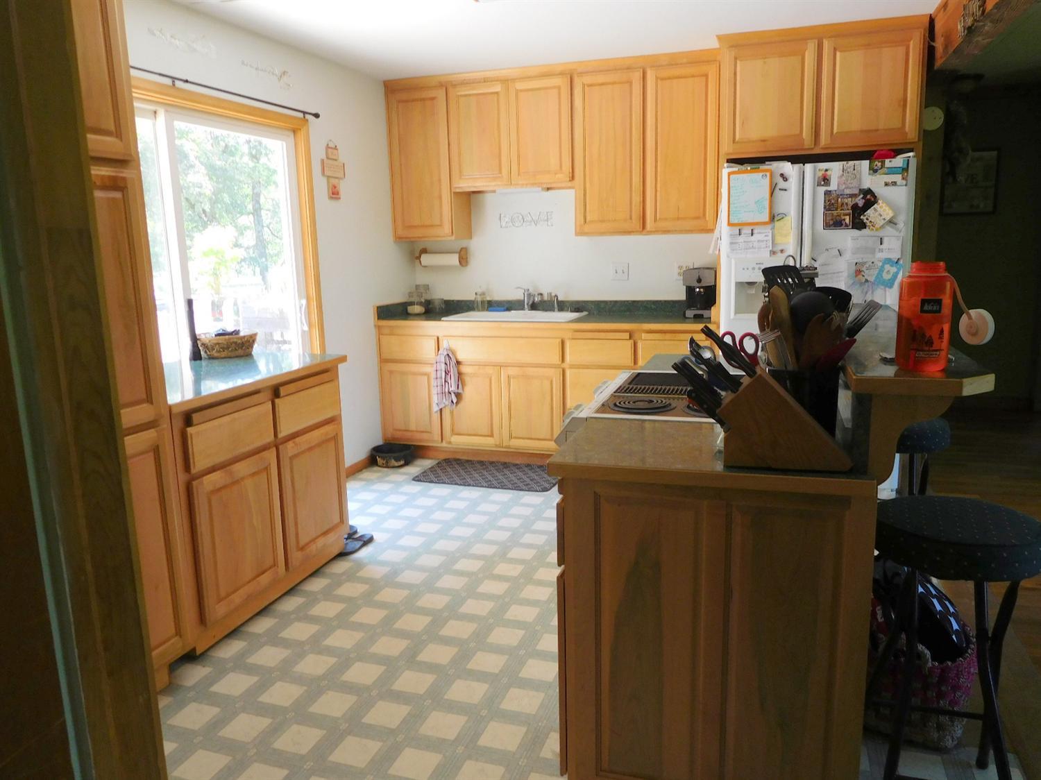 5685 Holland Loop Road Cave Junction, OR 97523 - Photo 8 of 18 An;other pretty shot of the kitchen.