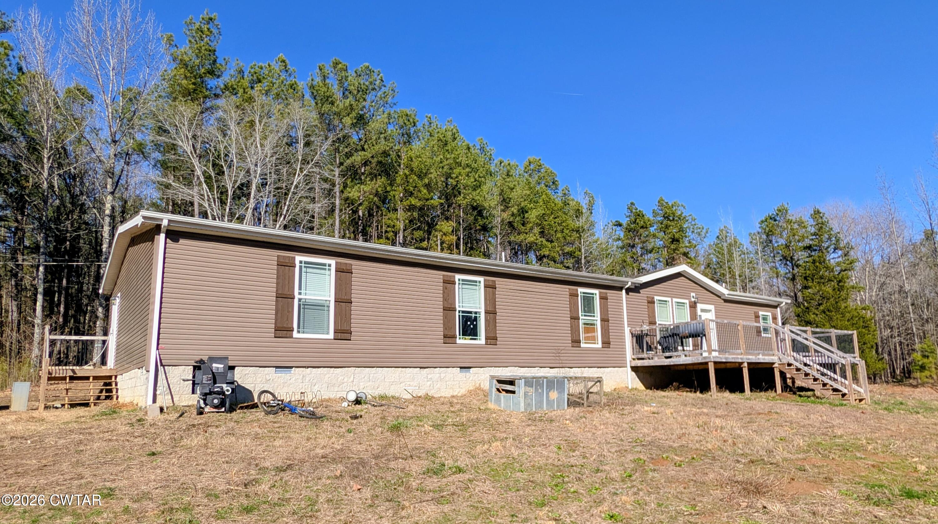 2935 Ed Barham Road Bethel Springs, TN 38315 - Photo 29 of 56 a front view of a house with a yard