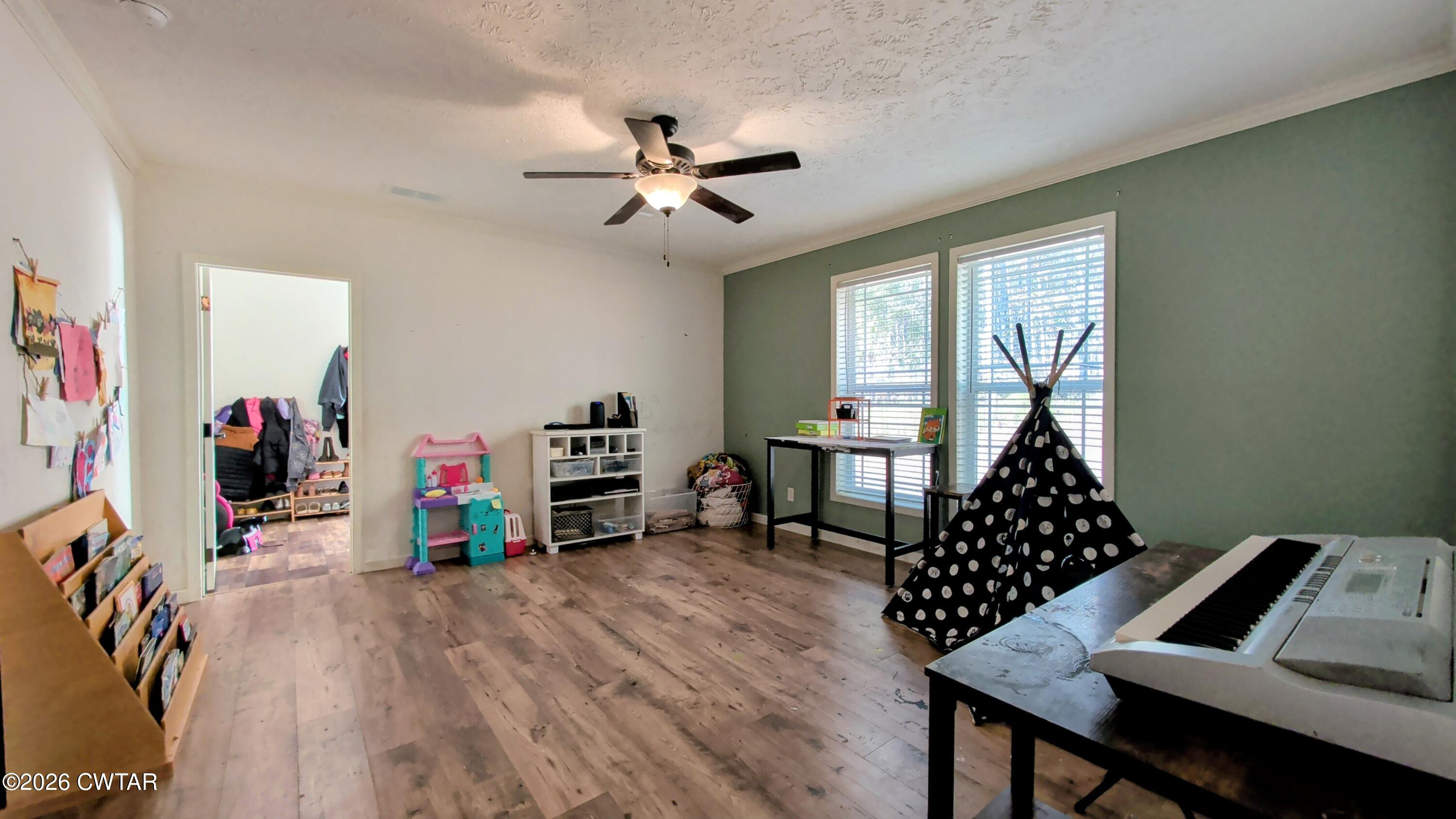 2935 Ed Barham Road Bethel Springs, TN 38315 - Photo 3 of 56 a living room with furniture and a wooden floor
