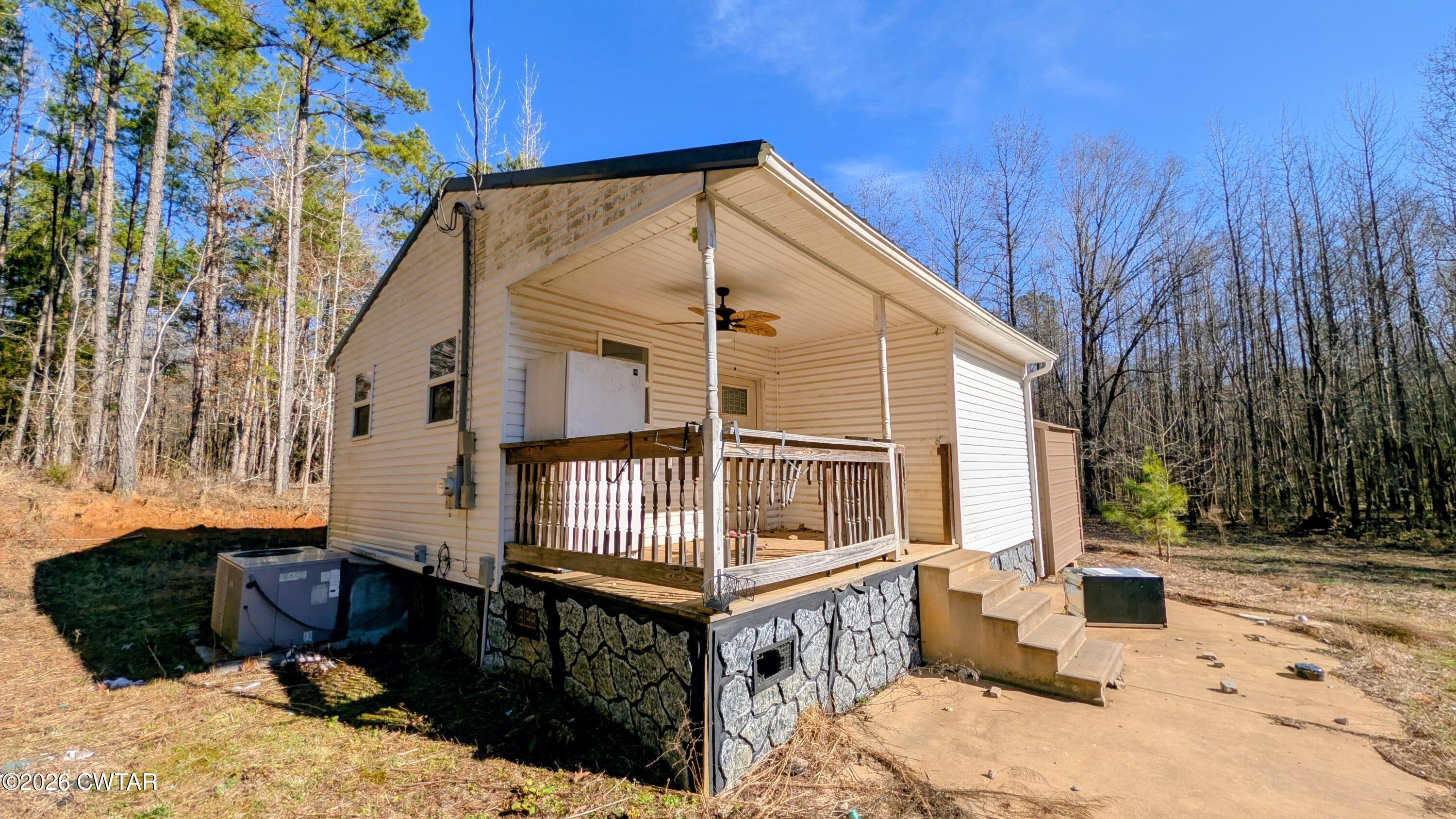2935 Ed Barham Road Bethel Springs, TN 38315 - Photo 38 of 56 a front view of a house with a yard