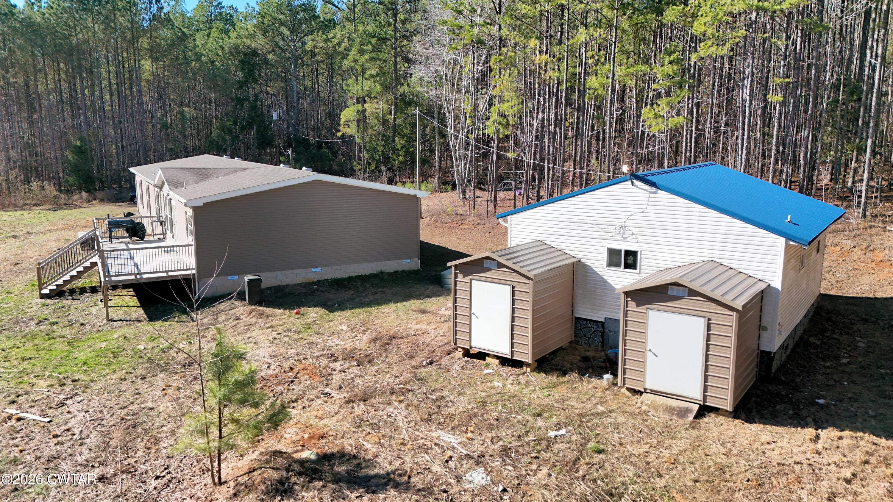 2935 Ed Barham Road Bethel Springs, TN 38315 - Photo 39 of 56 a view of a house with a yard