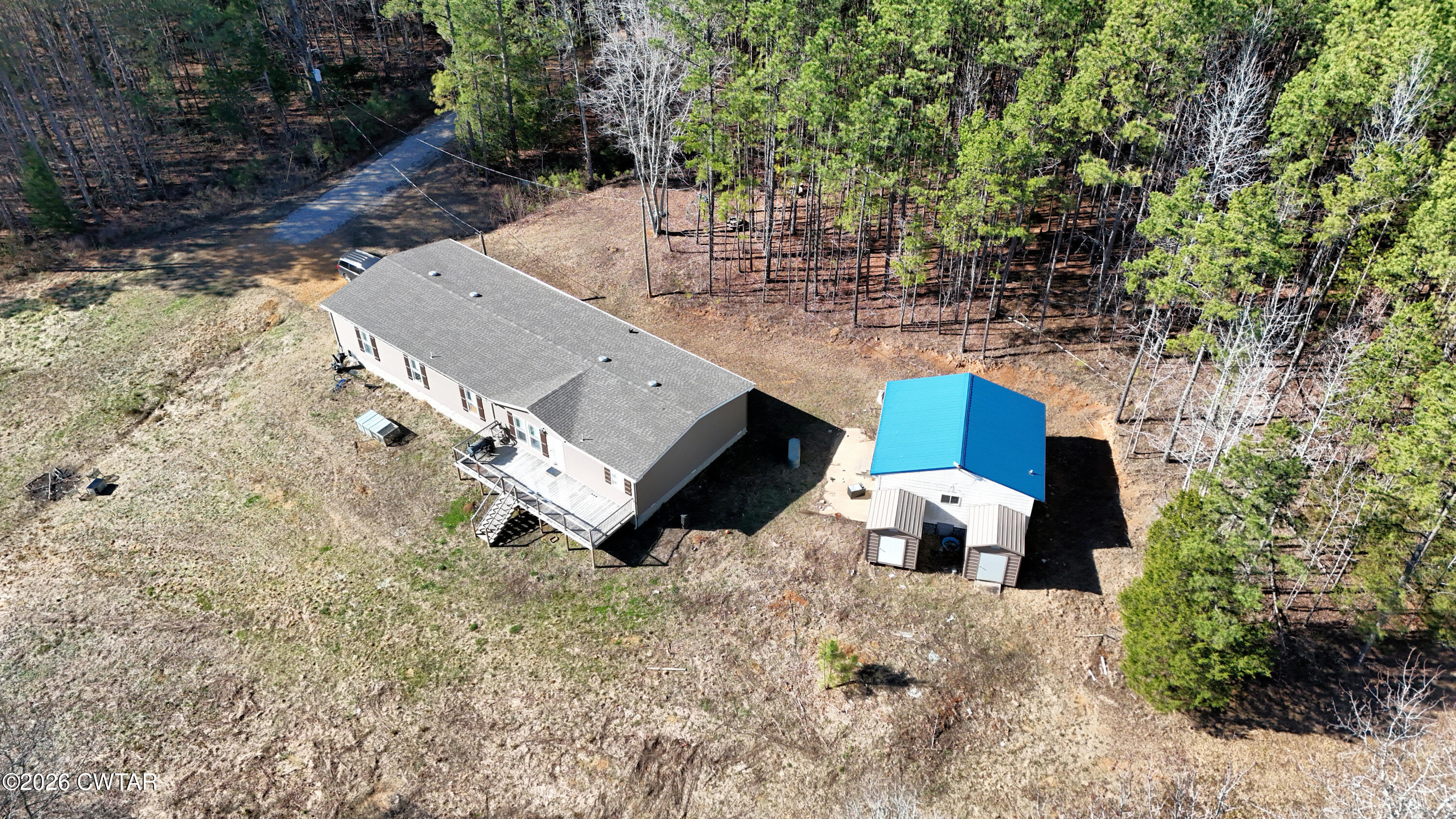2935 Ed Barham Road Bethel Springs, TN 38315 - Photo 50 of 56 a view of a house with a yard