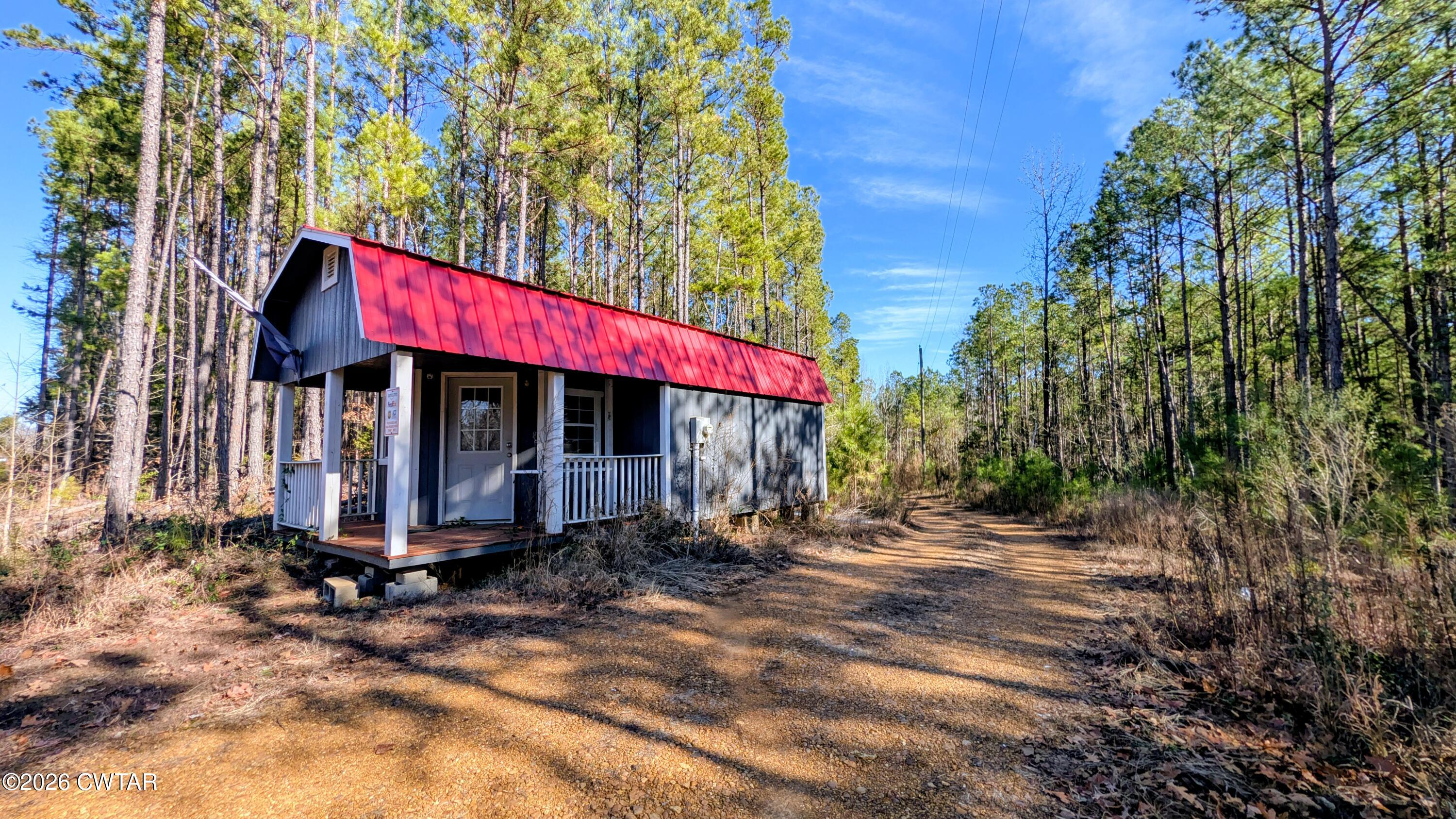 2935 Ed Barham Road Bethel Springs, TN 38315 - Photo 54 of 56 a view of a house with a yard