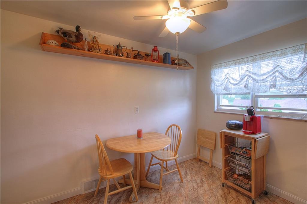 735 Beaver Street Rochester, PA 15074 - Photo 4 of 22 Dining Room also offers fresh air, new flooring and good lighting.