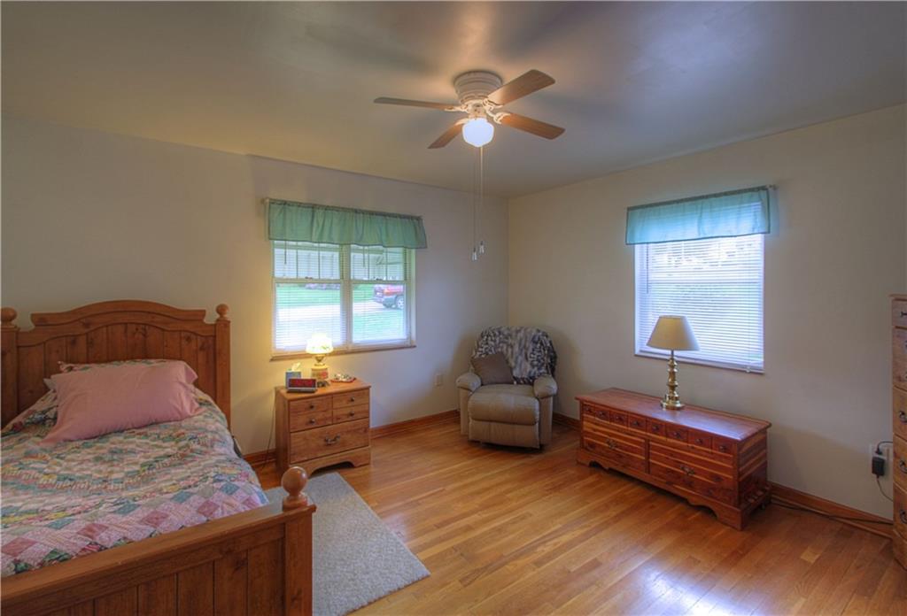 735 Beaver Street Rochester, PA 15074 - Photo 8 of 22 Master Bedroom is generously sized and boasts fresh air and sunshine through the newer vinyl windows.