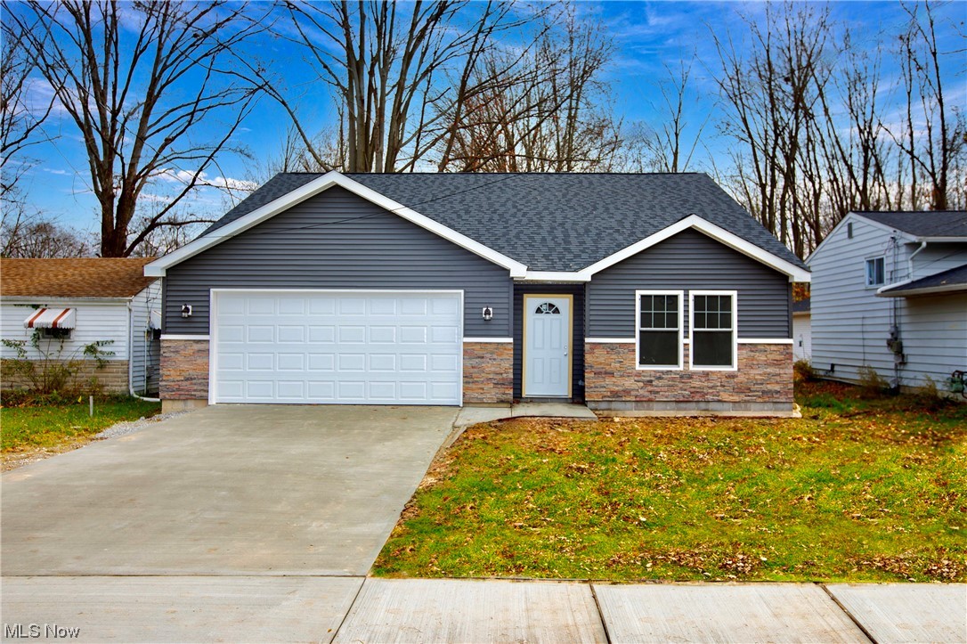 5461 Lear Nagle Road North Ridgeville, OH 44039 - Photo 1 of 26 View of front facade featuring a garage