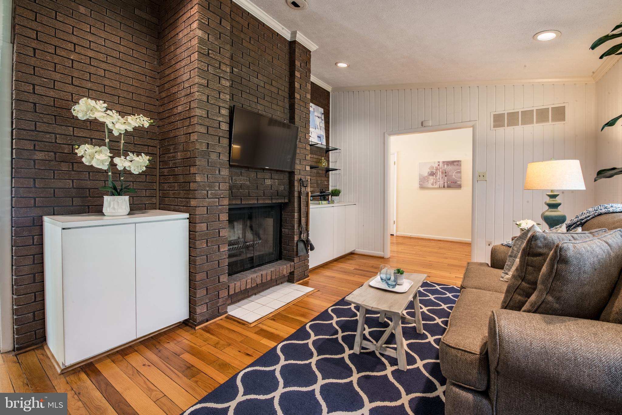 3500 Englemeade Road Baltimore, MD 21208 - Photo 6 of 35 DEN WITH BRICK FIREPLACE