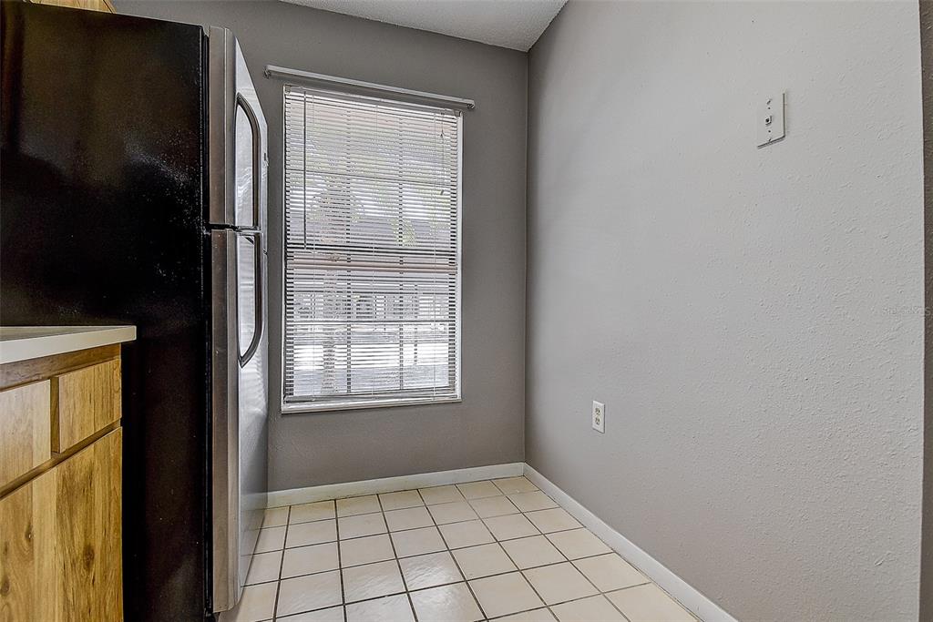 4752 Sunny Loop, Unit 4752 Holiday, FL 34690 - Photo 15 of 28 a view of an empty room with windows
