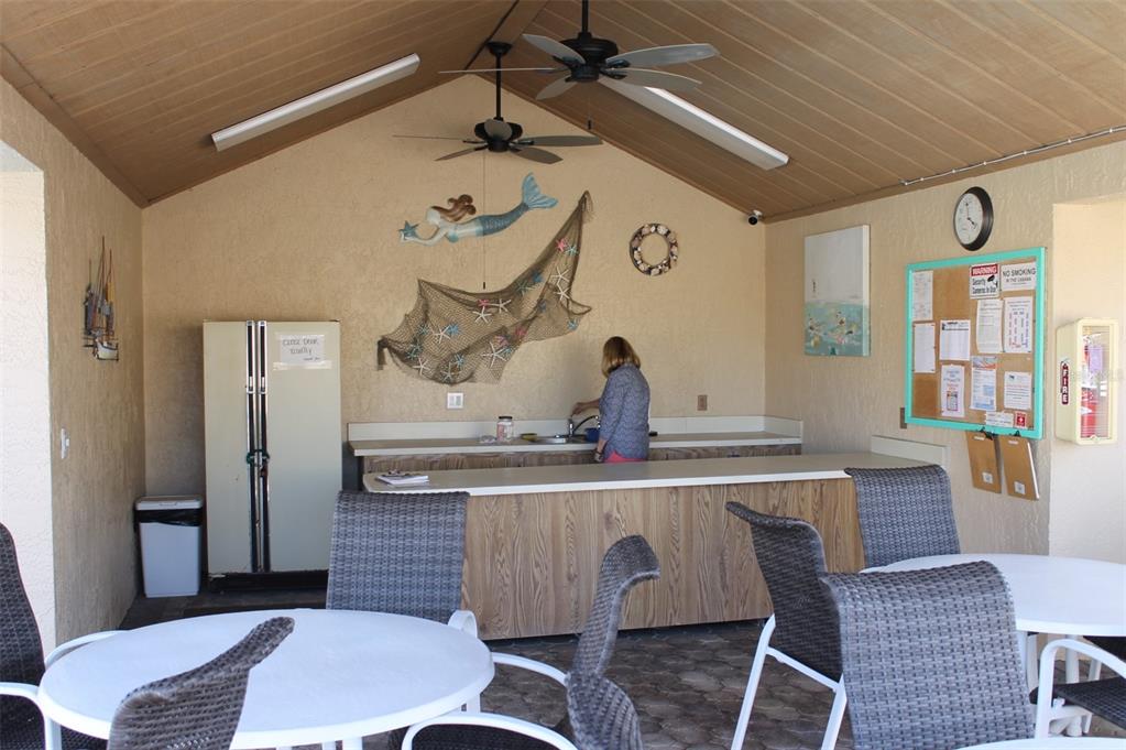 4752 Sunny Loop, Unit 4752 Holiday, FL 34690 - Photo 28 of 28 a dining room with wooden floor