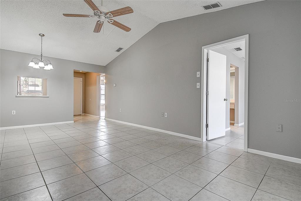 4752 Sunny Loop, Unit 4752 Holiday, FL 34690 - Photo 6 of 28 a view of an empty room with a window