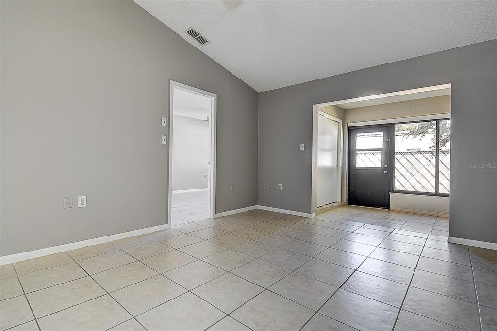 4752 Sunny Loop, Unit 4752 Holiday, FL 34690 - Photo 10 of 28 a view of an empty room and window