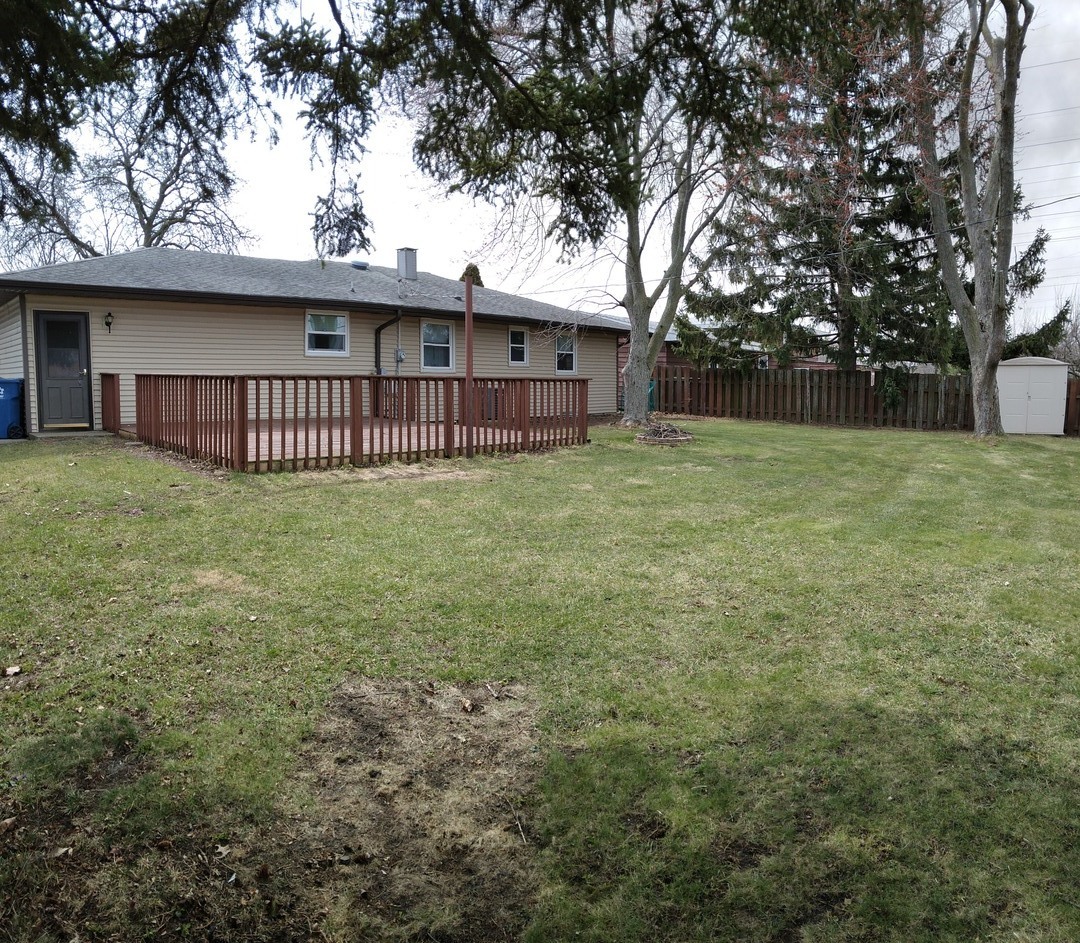 1920 Root Street Crest Hill, IL 60403 - Photo 17 of 17 a view of a house with a yard