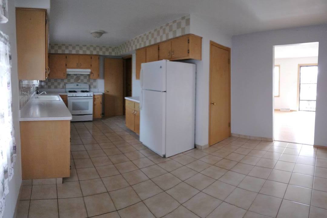 1920 Root Street Crest Hill, IL 60403 - Photo 4 of 17 a utility room with cabinets washer and dryer