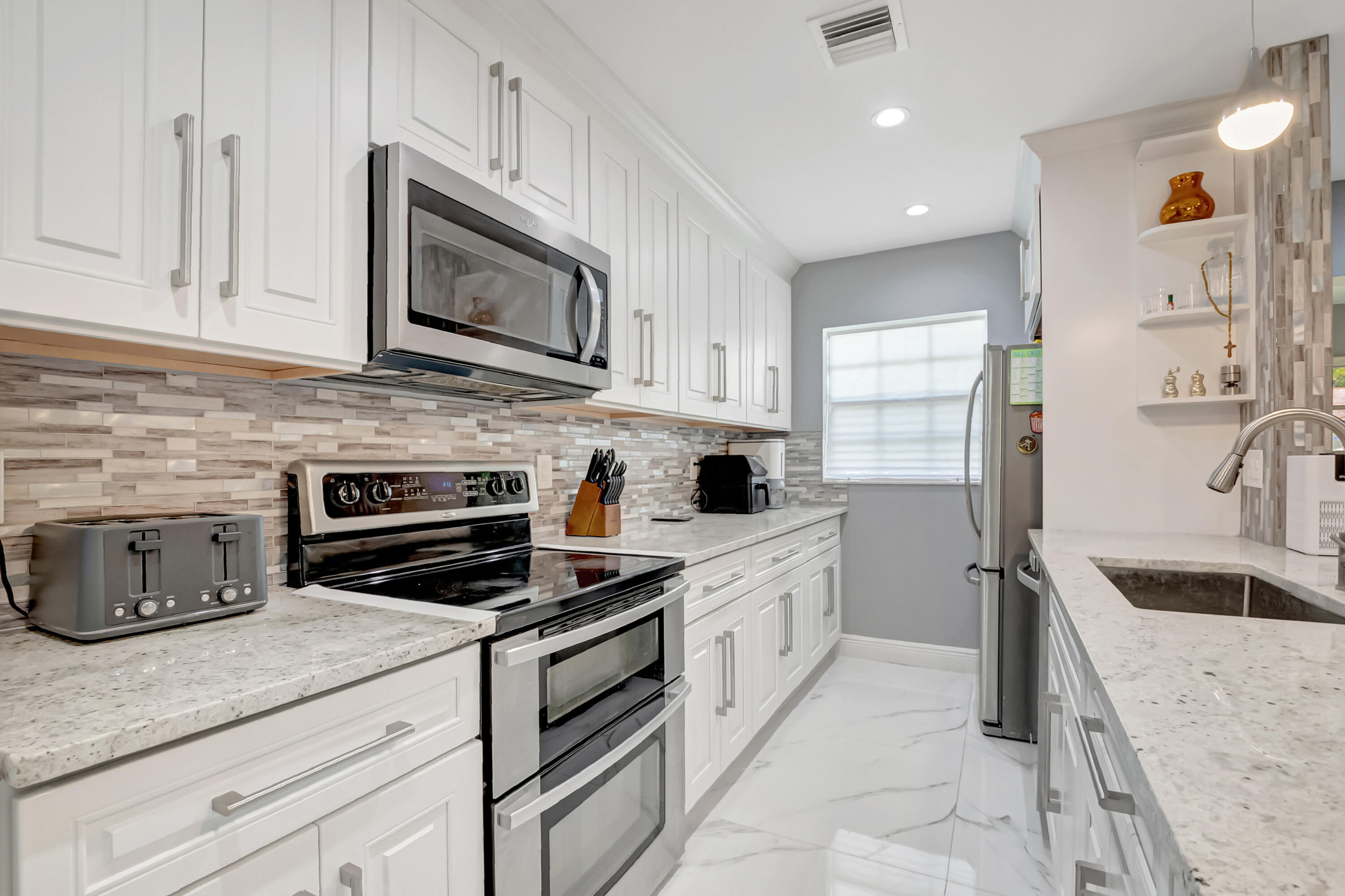 14010 Nesting Way Delray Beach, FL 33484 - Photo 4 of 43 19-print-DSC_7944
