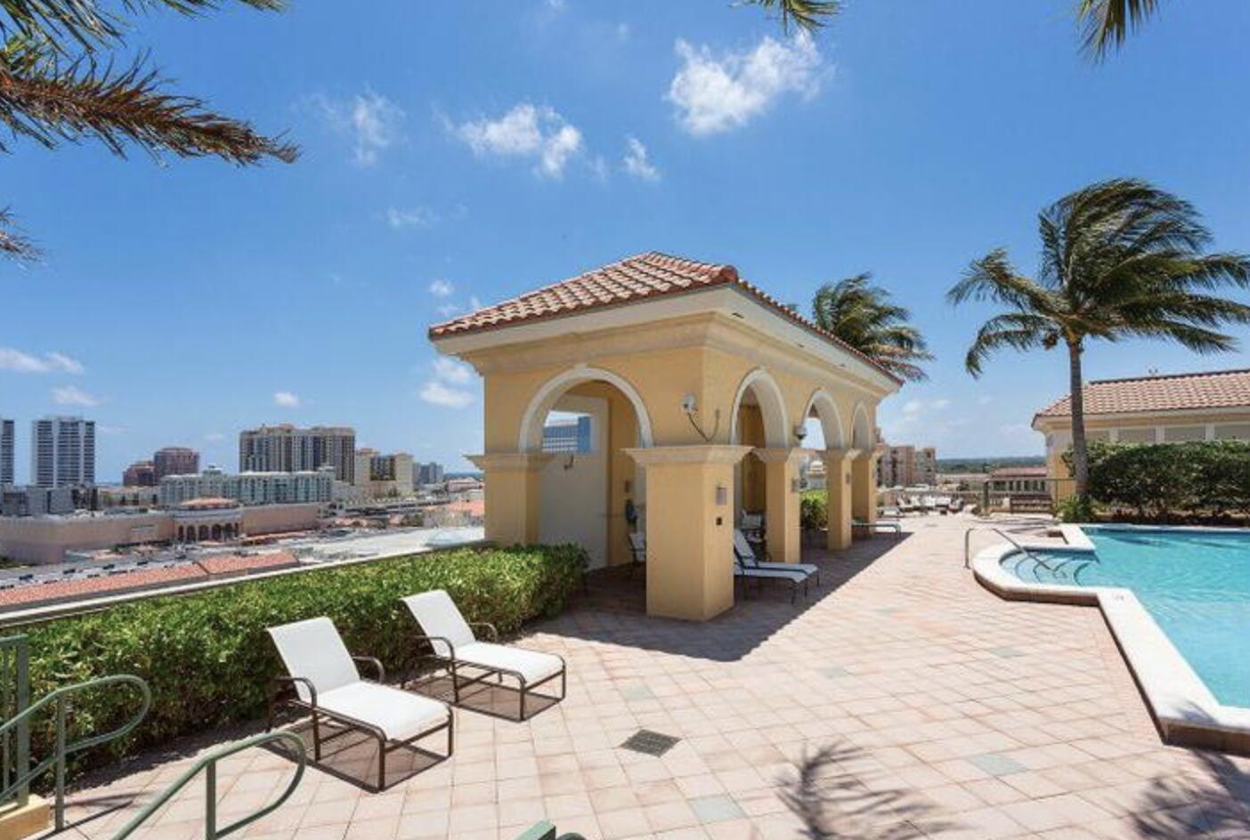 403 South Sapodilla Avenue, Unit 618 West Palm Beach, FL 33401 - Photo 17 of 20 a view of a chairs and tables in patio