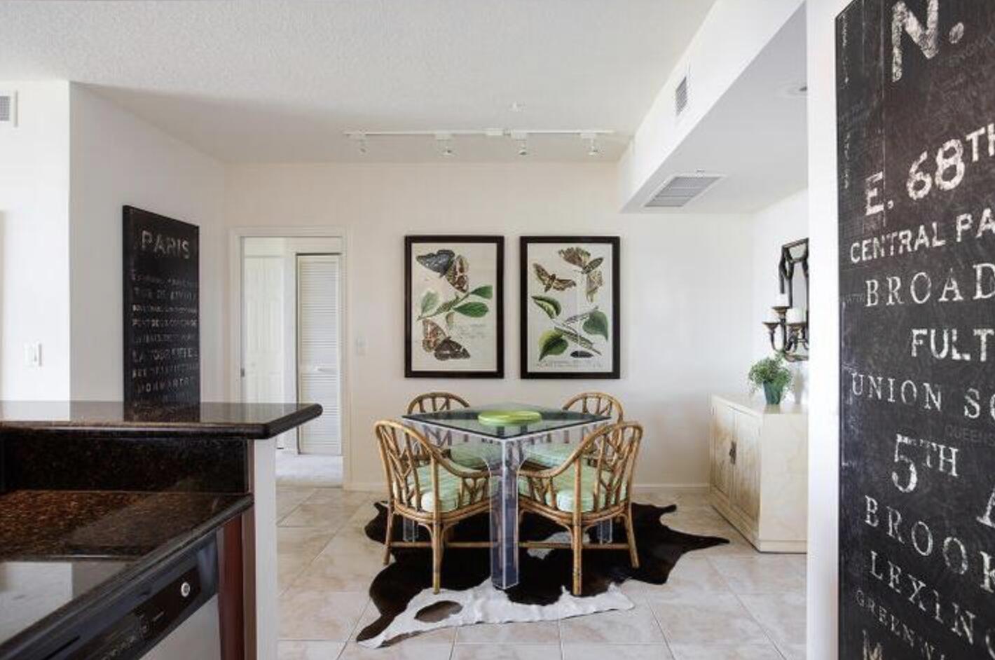 403 South Sapodilla Avenue, Unit 618 West Palm Beach, FL 33401 - Photo 6 of 20 a view of a dining room with furniture and front door
