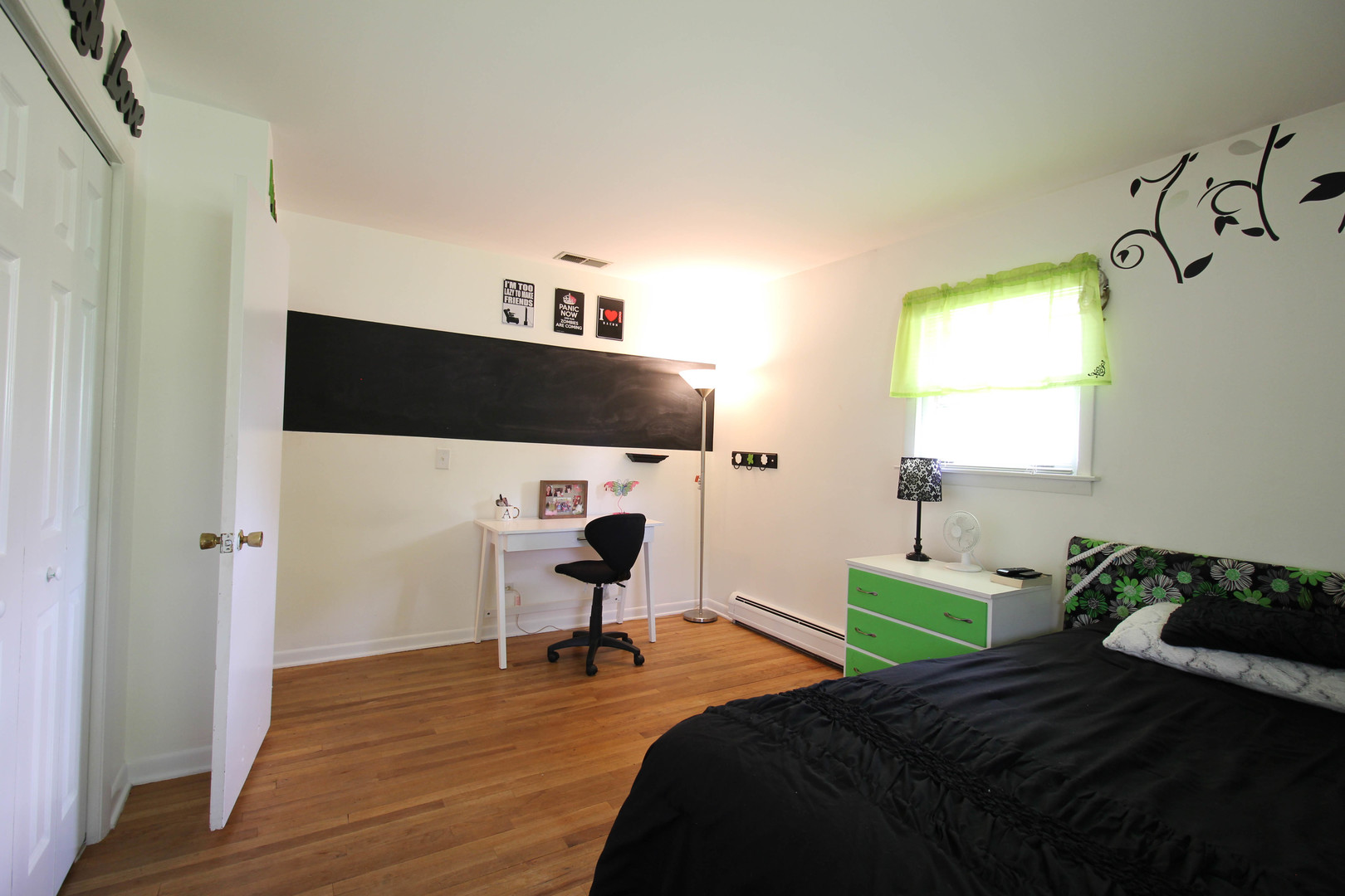 10-s021 Plainfield-Naperville Road Naperville, IL 60565 - Photo 12 of 40 a bedroom with a bed and a table in it