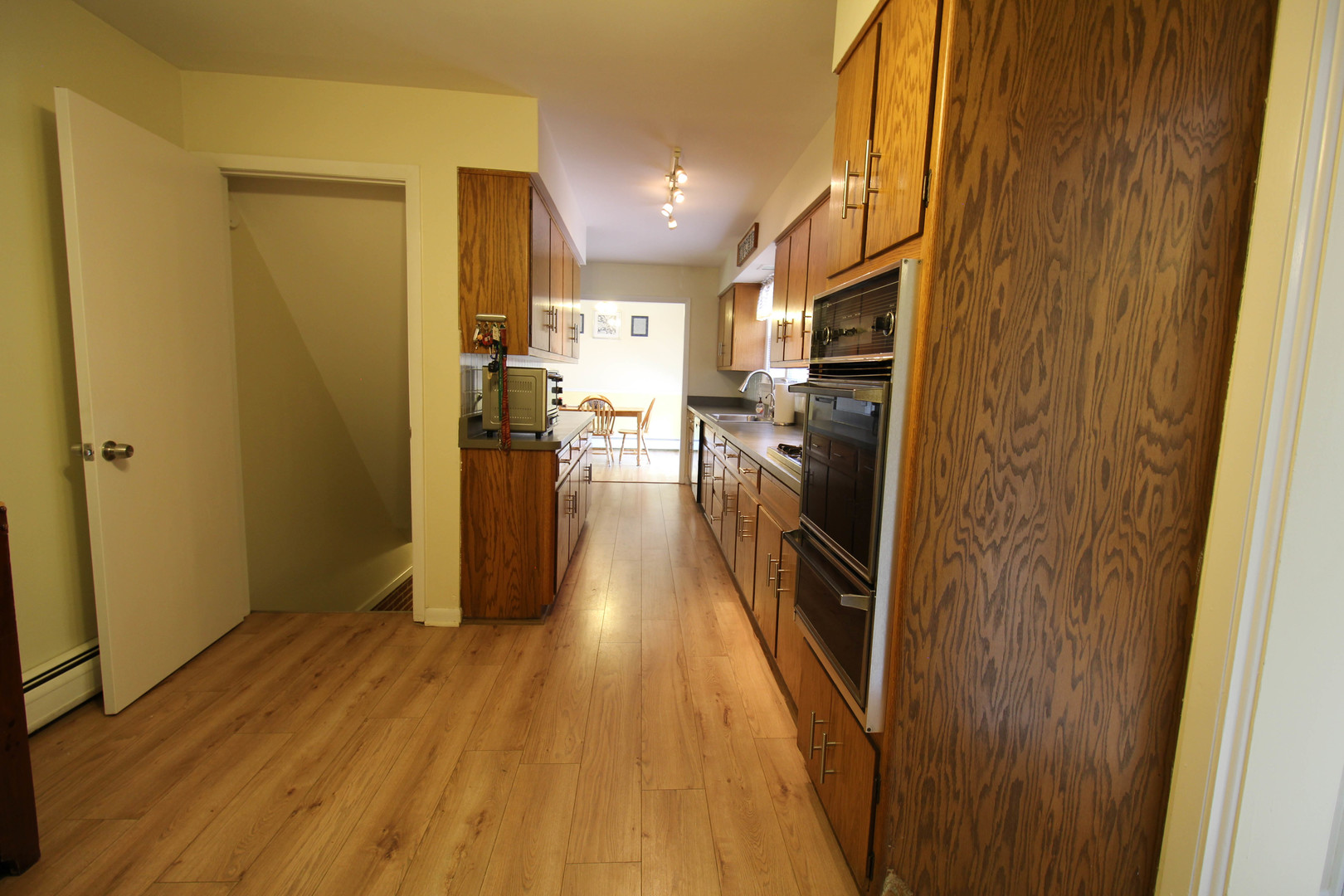 10-s021 Plainfield-Naperville Road Naperville, IL 60565 - Photo 20 of 40 a view of a kitchen from the hallway