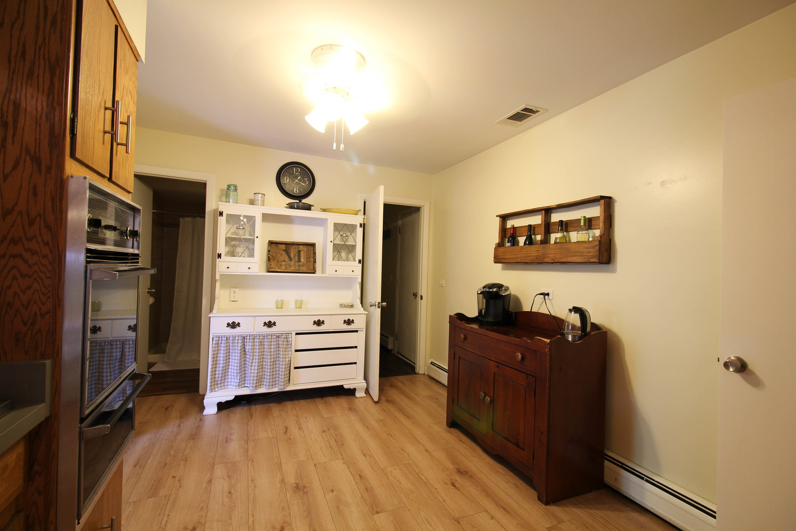 10-s021 Plainfield-Naperville Road Naperville, IL 60565 - Photo 21 of 40 a bedroom with furniture and wooden floor