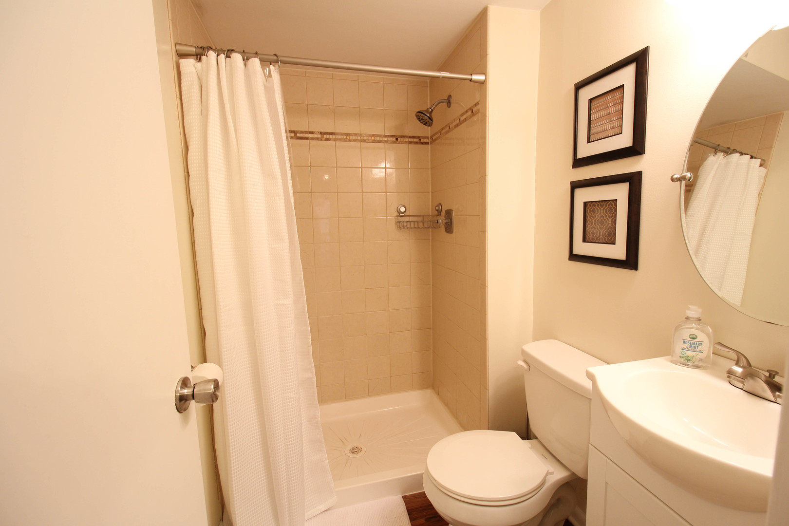 10-s021 Plainfield-Naperville Road Naperville, IL 60565 - Photo 23 of 40 a bathroom with a toilet a sink and a shower