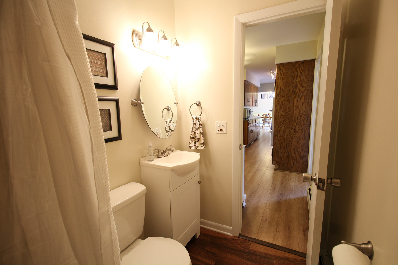 10-s021 Plainfield-Naperville Road Naperville, IL 60565 - Photo 24 of 40 a bathroom with a granite countertop sink mirror vanity and toilet