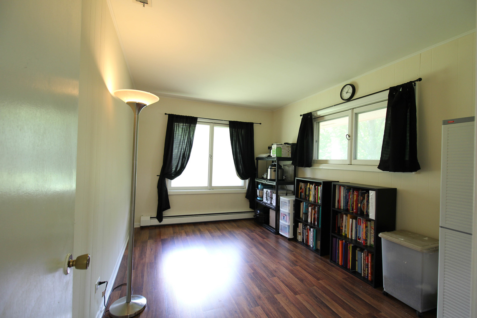 10-s021 Plainfield-Naperville Road Naperville, IL 60565 - Photo 28 of 40 a view of a livingroom with furniture and hardwood floor