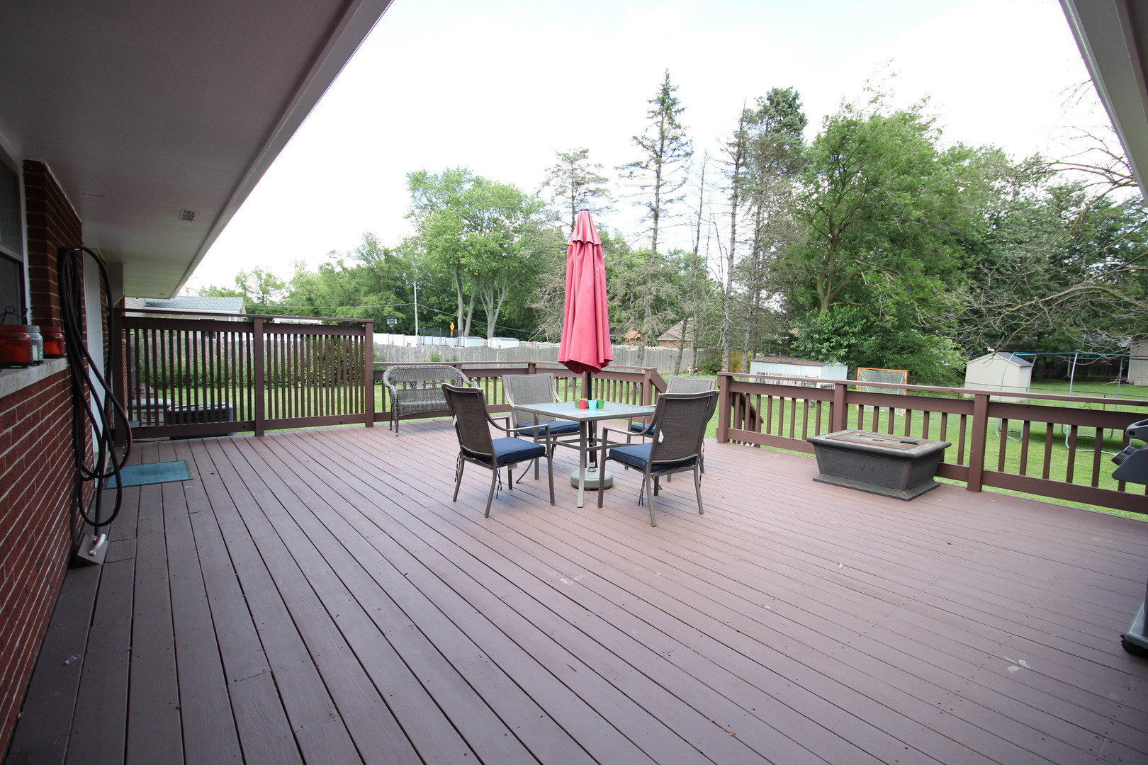 10-s021 Plainfield-Naperville Road Naperville, IL 60565 - Photo 37 of 40 a view of a deck with wooden floor and outdoor seating