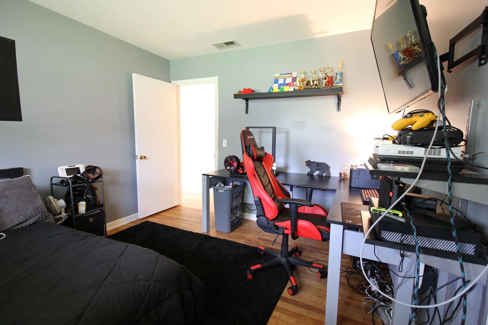 10-s021 Plainfield-Naperville Road Naperville, IL 60565 - Photo 10 of 40 a bedroom with furniture and a gym equipment