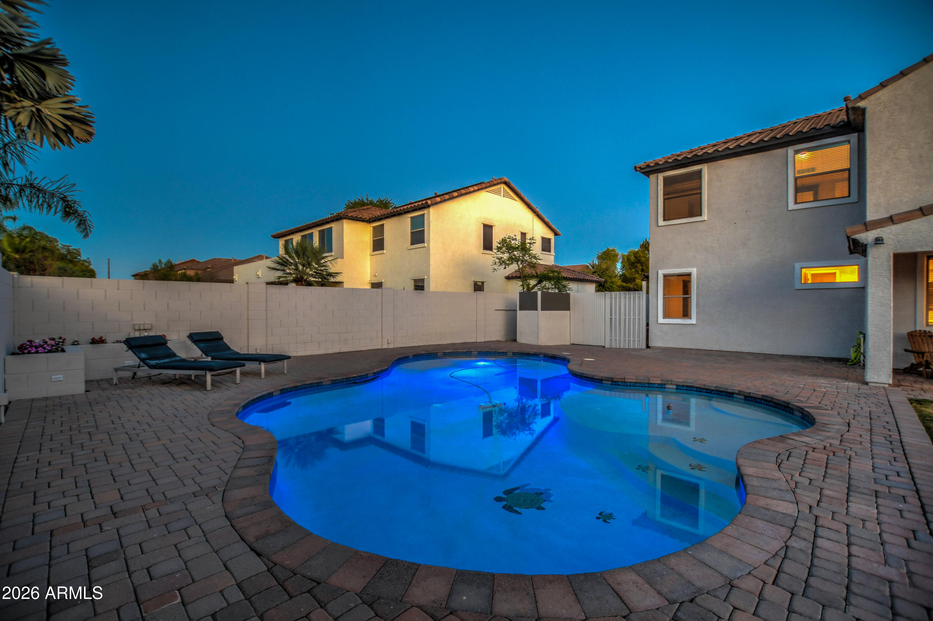 3078 East Muirfield Street Gilbert, AZ 85298 - Photo 86 of 92 a swimming pool with yard barbeque oven and outdoor seating