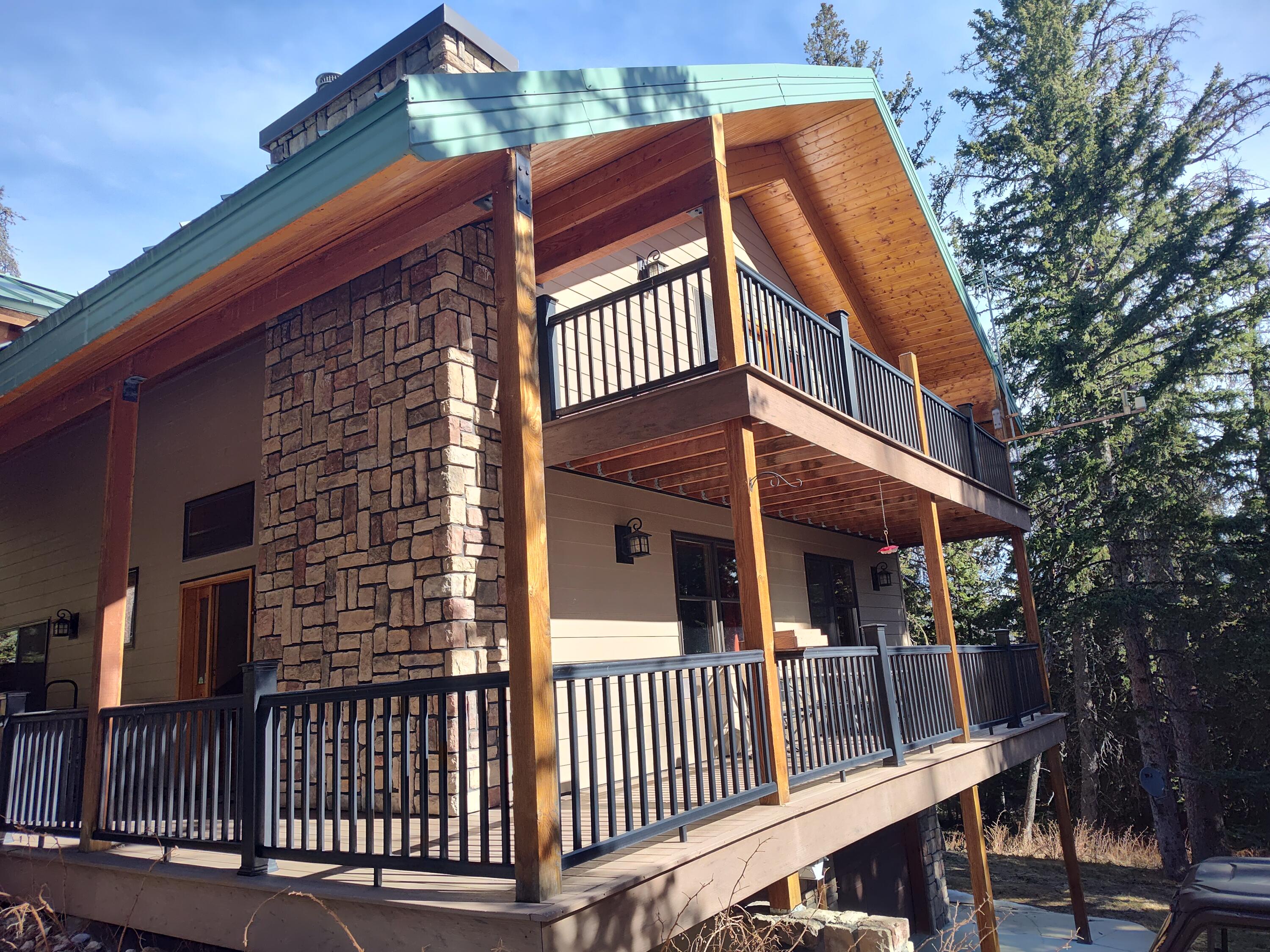 45 Blacktooth Road Sheridan, WY 82801 - Photo 2 of 47 Upper drive view of porches