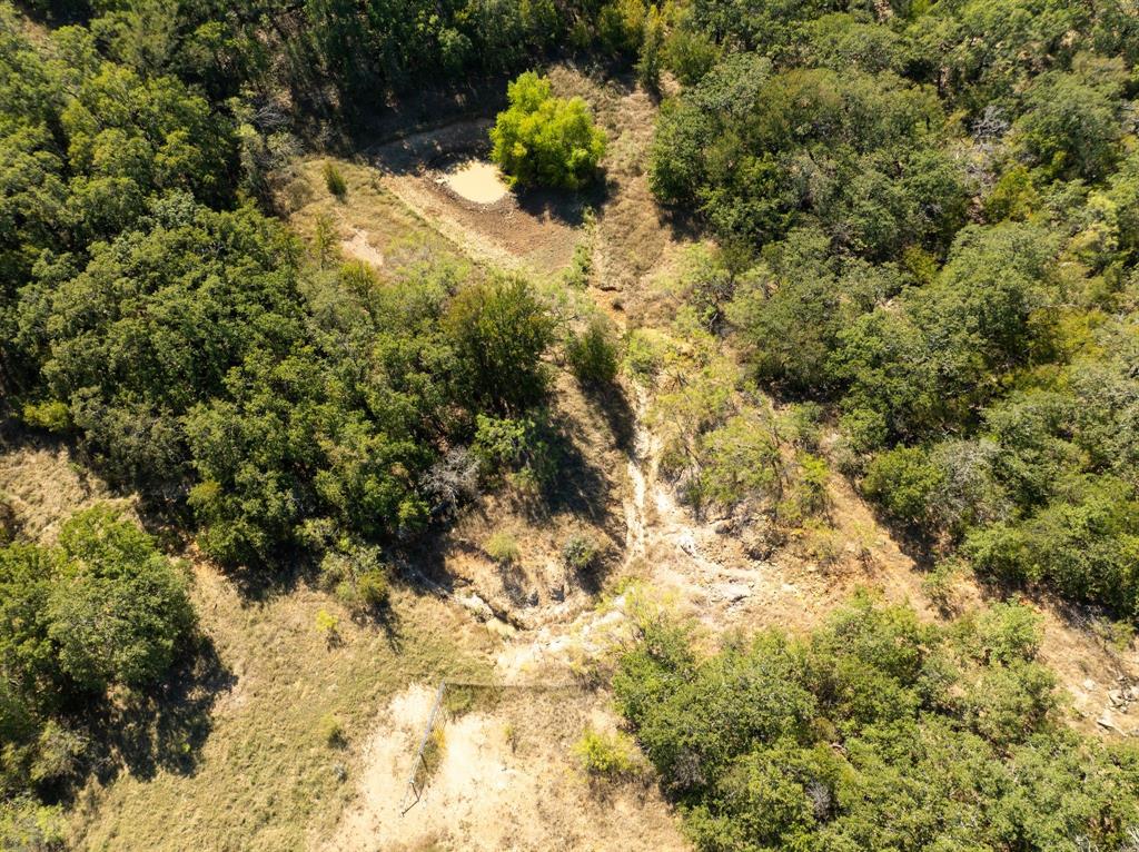 Tbd Oilfield Road Jacksboro, TX 76458 - Photo 25 of 35 a view of a yard with trees