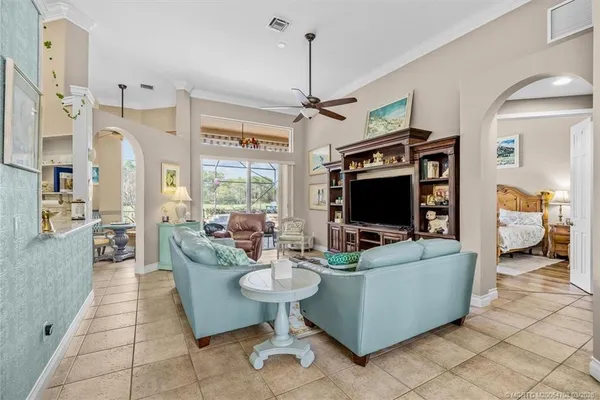 a kitchen with lots of counter top space sink and stainless steel appliances