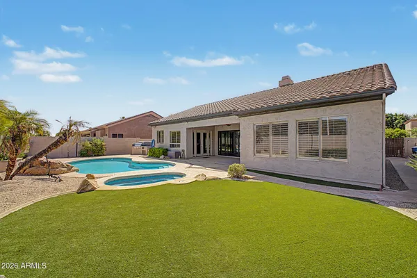 a swimming pool with outdoor seating yard and livingroom