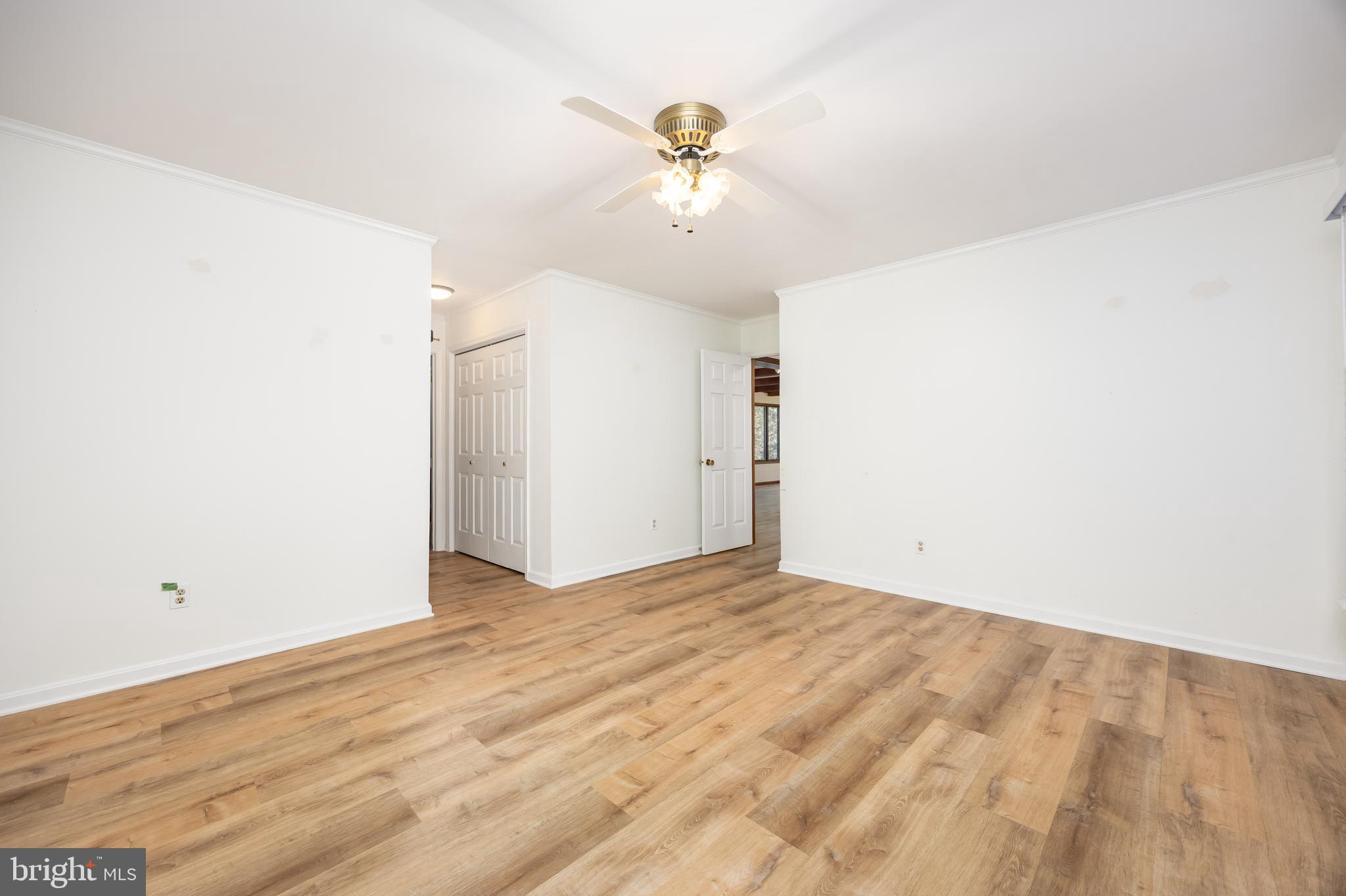 19 Brookside Road Ocean Pines, MD 21811 - Photo 24 of 80 a view of an empty room with wooden floor