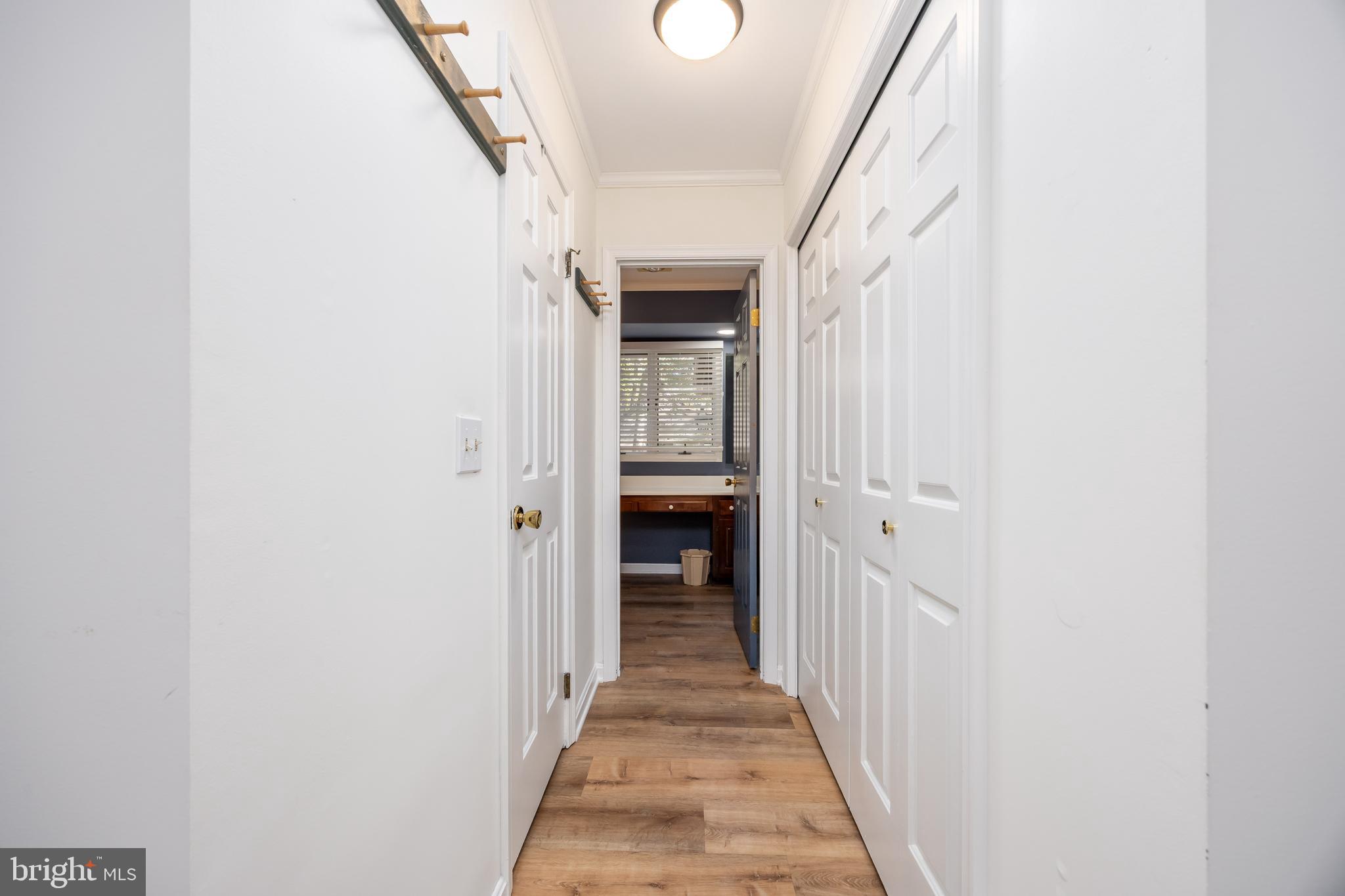 19 Brookside Road Ocean Pines, MD 21811 - Photo 27 of 80 a view of a hallway with wooden floor and entryway