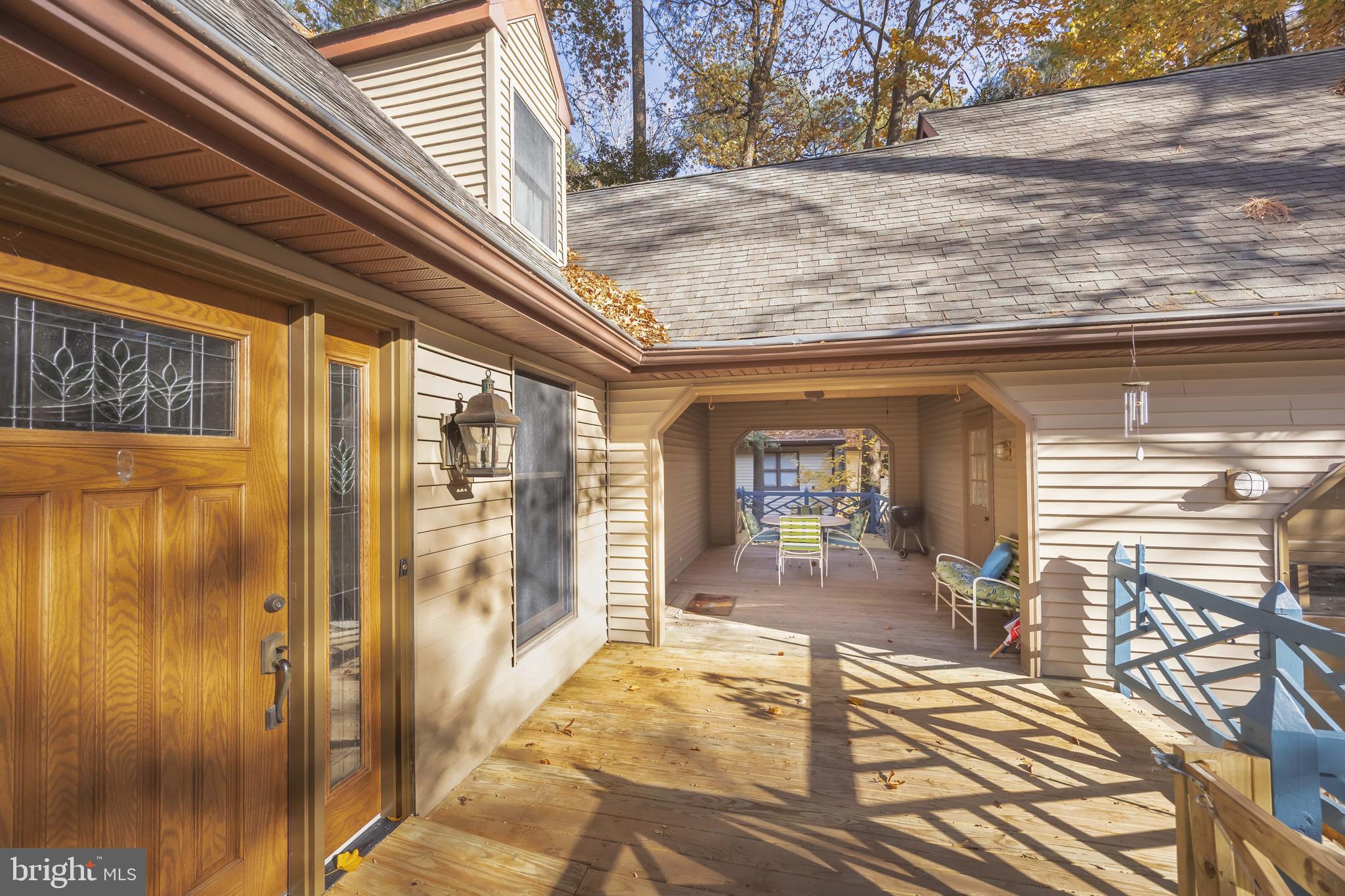 19 Brookside Road Ocean Pines, MD 21811 - Photo 3 of 80 a view of a hallway with wooden floor and furniture