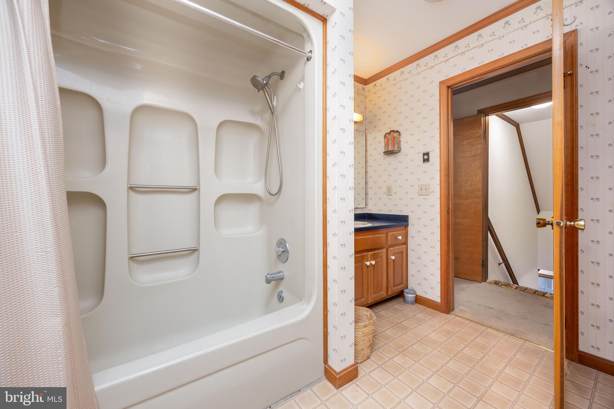 19 Brookside Road Ocean Pines, MD 21811 - Photo 42 of 80 a bathroom with a bathtub and a sink