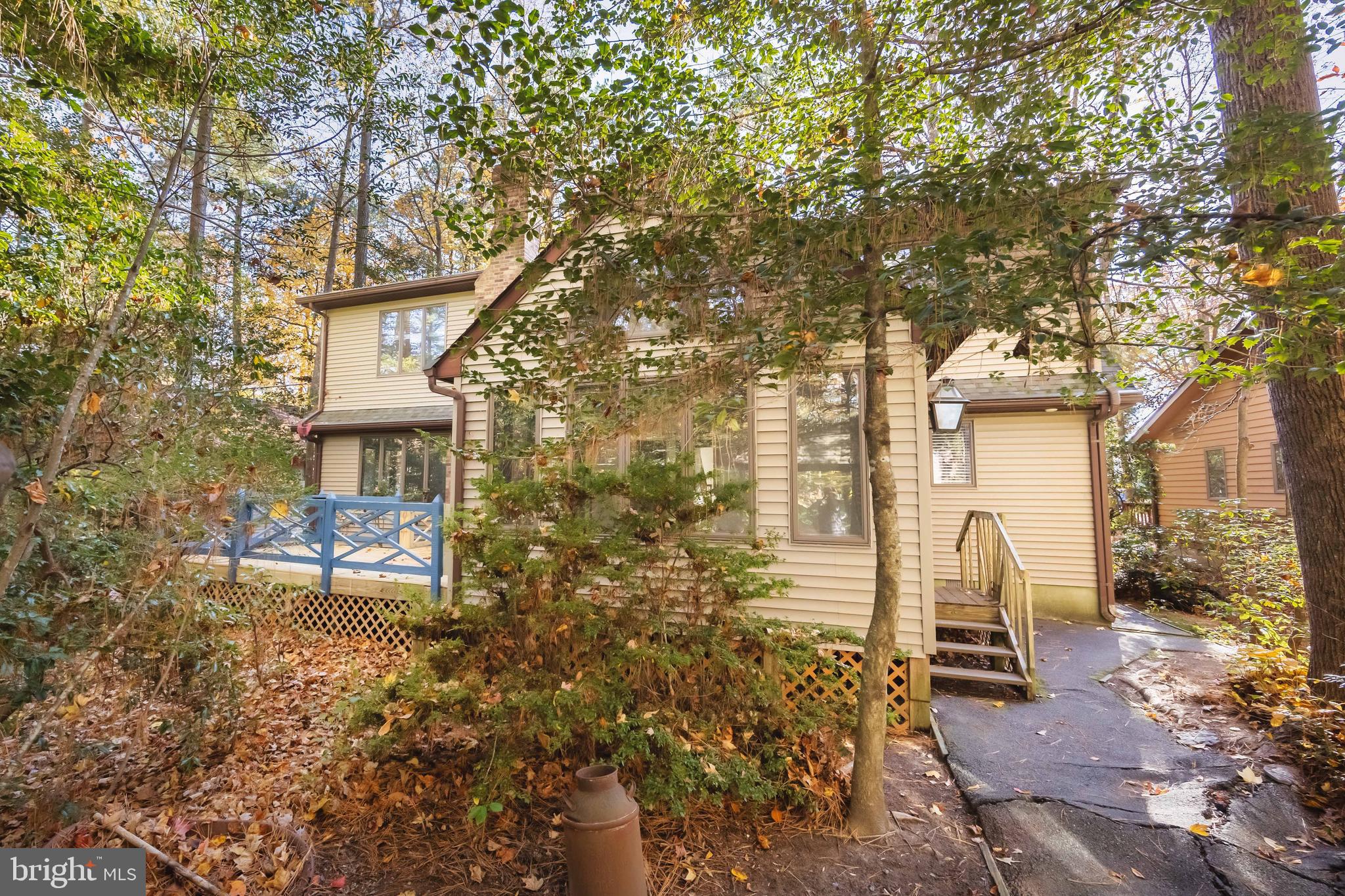 19 Brookside Road Ocean Pines, MD 21811 - Photo 60 of 80 a front view of a house with outdoor seating