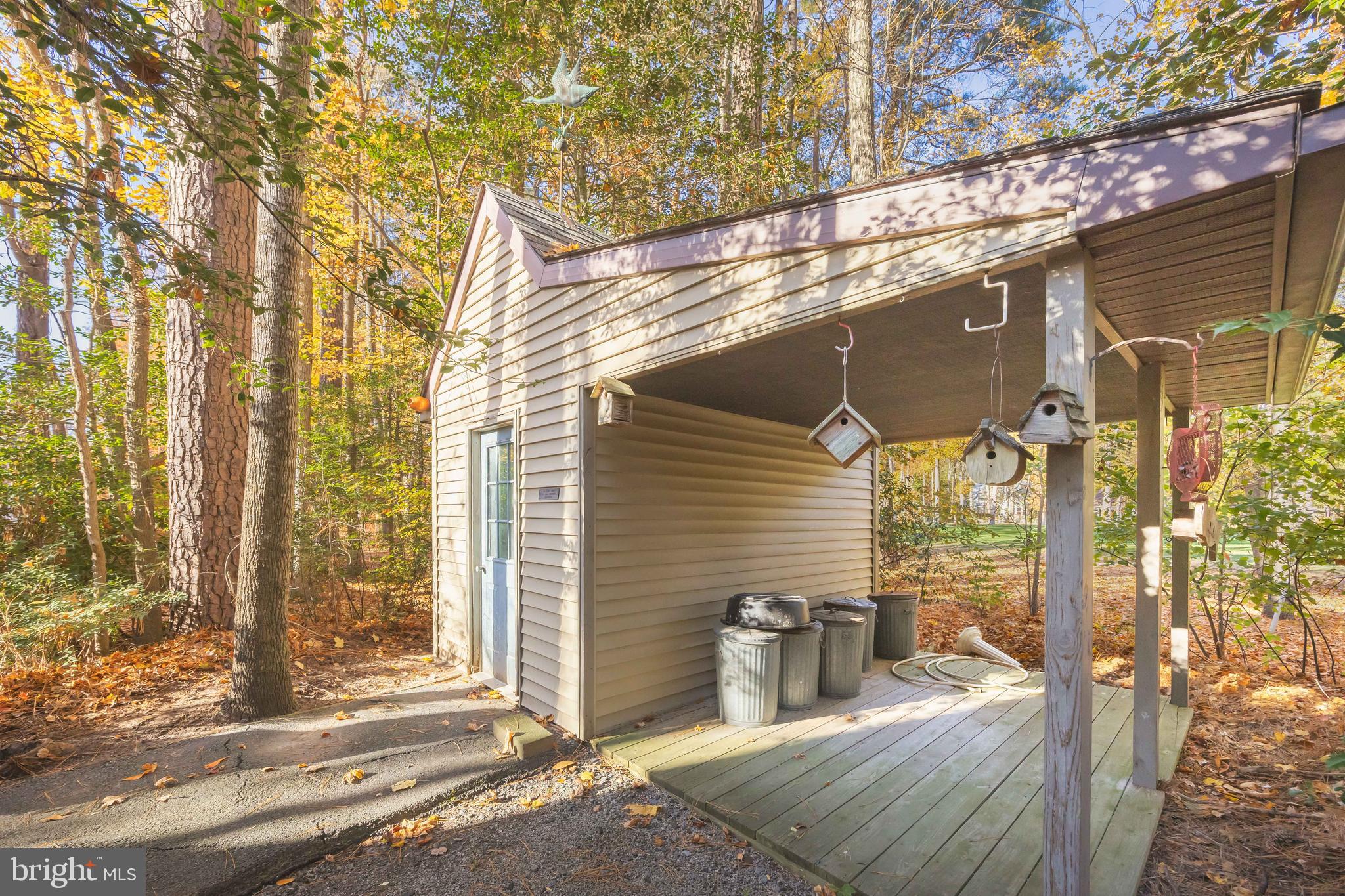 19 Brookside Road Ocean Pines, MD 21811 - Photo 63 of 80 a view of a chair and table in the patio