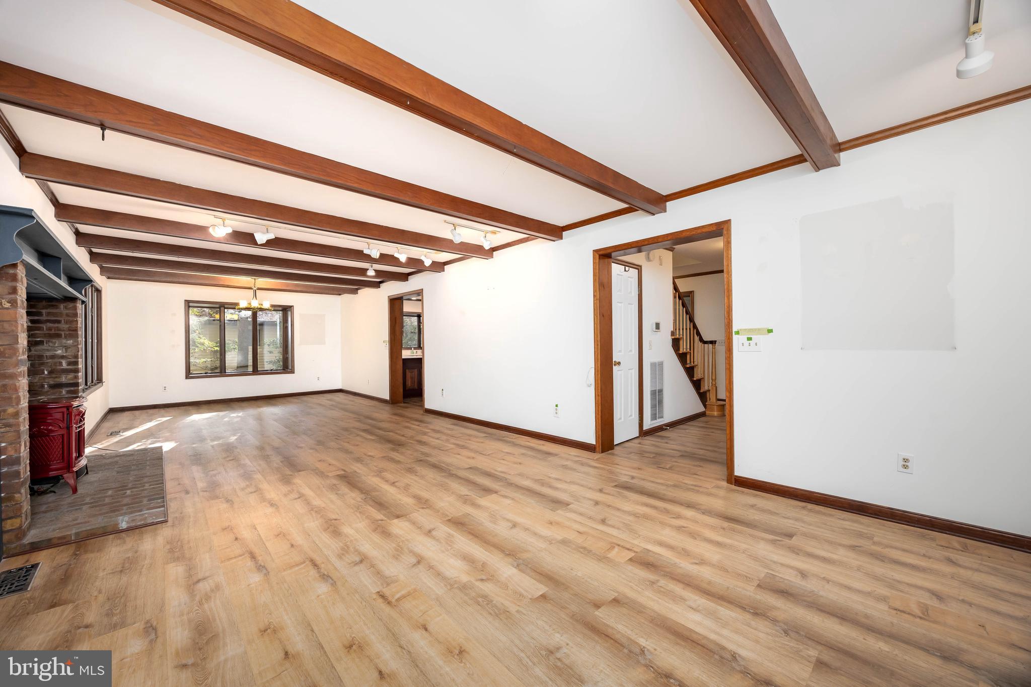 19 Brookside Road Ocean Pines, MD 21811 - Photo 7 of 80 a view of empty room with wooden floor and fan