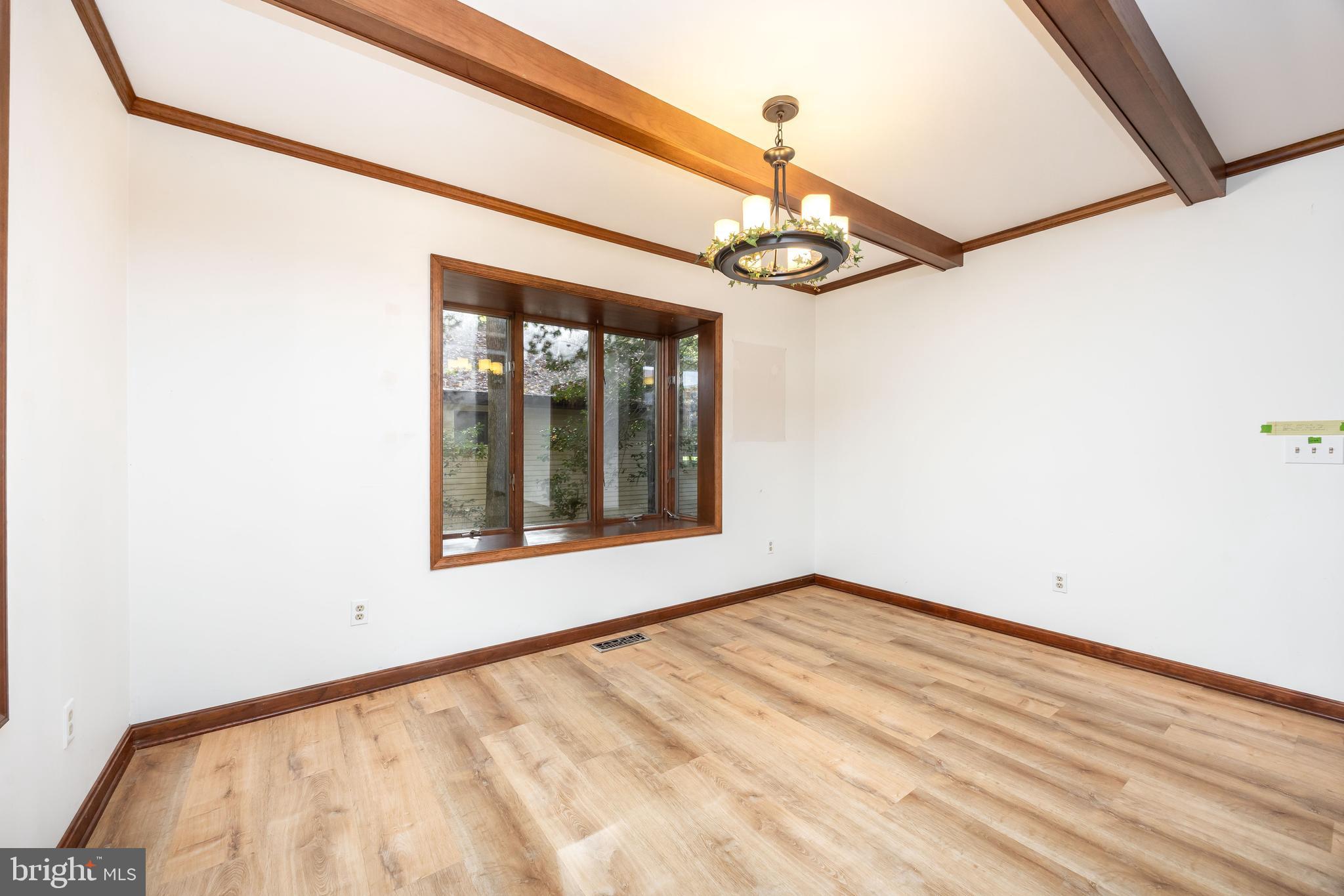 19 Brookside Road Ocean Pines, MD 21811 - Photo 10 of 80 a view of empty room with wooden floor and fan
