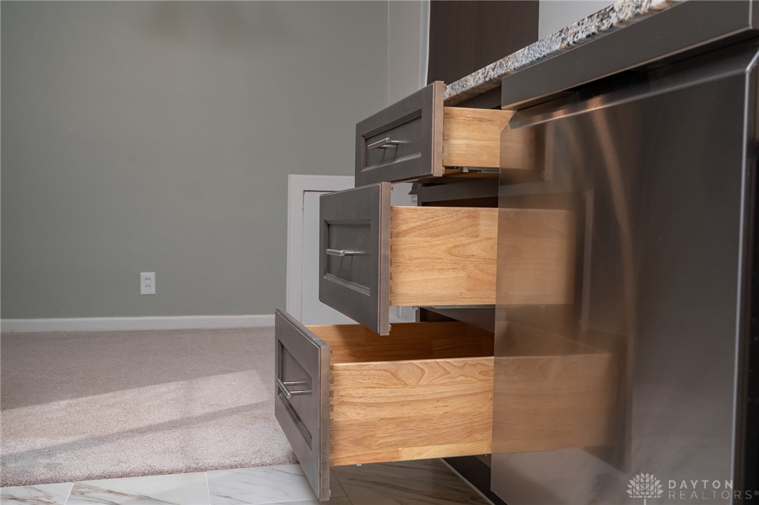 326 North Bromfield Road Kettering, OH 45429 - Photo 11 of 30 This modern kitchen features sleek cabinetry and stainless steel appliances.