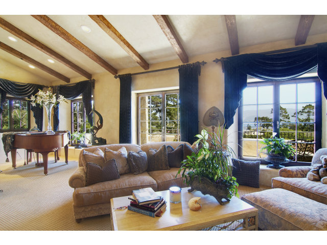 3294 Stevenson Drive Pebble Beach, CA 93953 - Photo 5 of 21 a living room with furniture and a large window