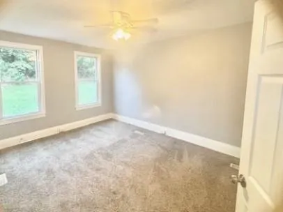 an empty room with windows