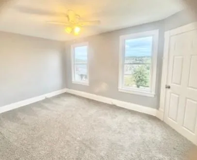 an empty room with windows